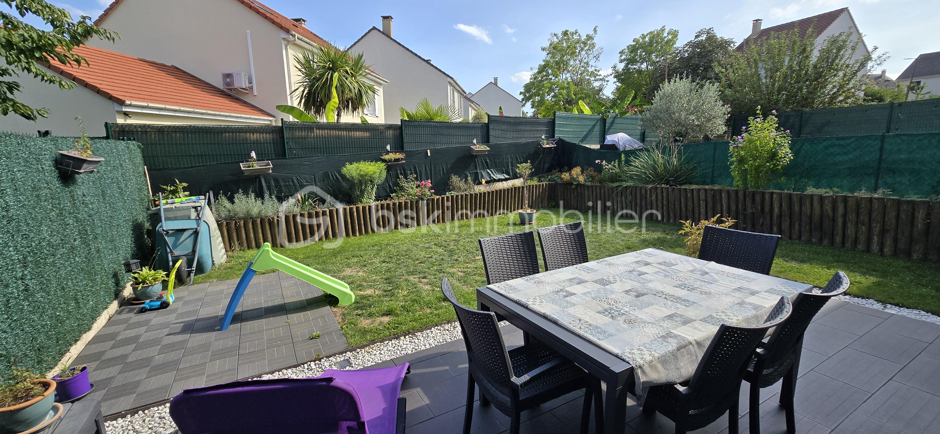 Maison de 98,61 m² - jardin.jpg