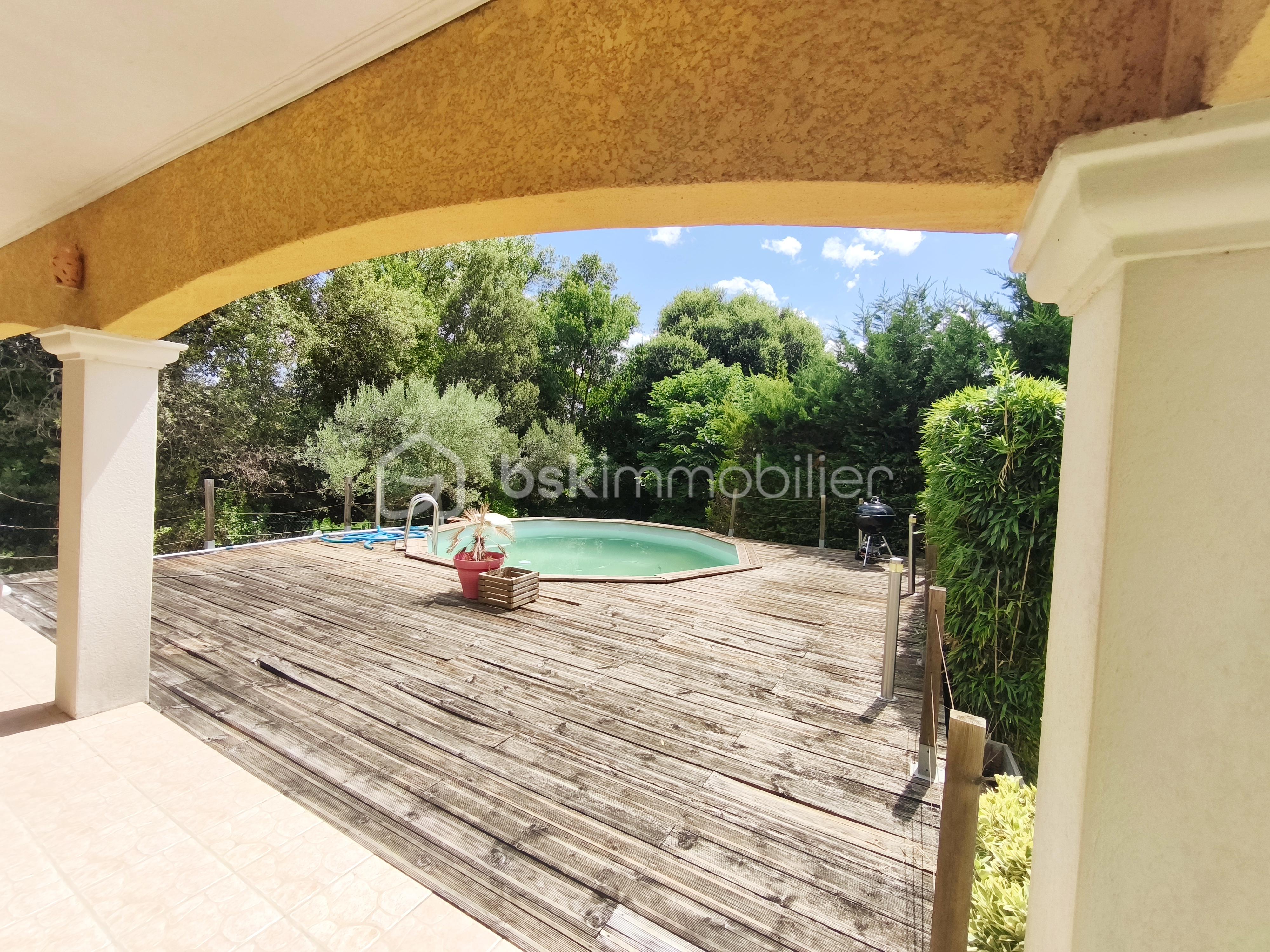 Maison de 132 m² - Exterieur terrasse piscine.jpg