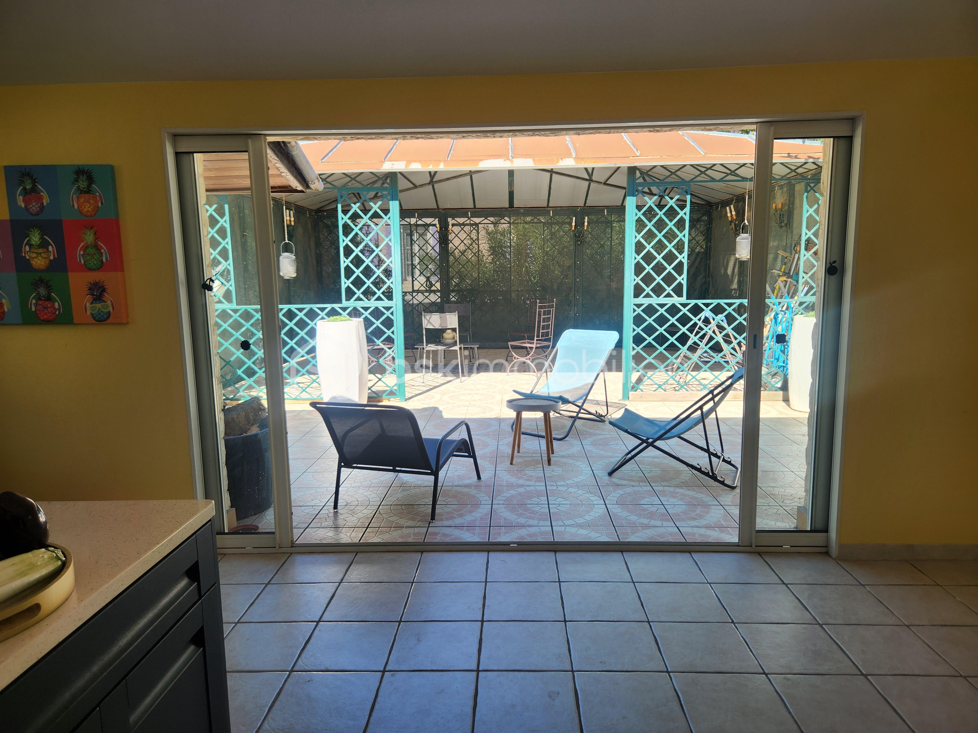 Appartement de 197 m² - Cuisine d'été vue barnum.jpg