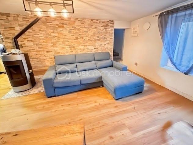 Maison traditionnelle de 90,99 m² - salon 2.jpg