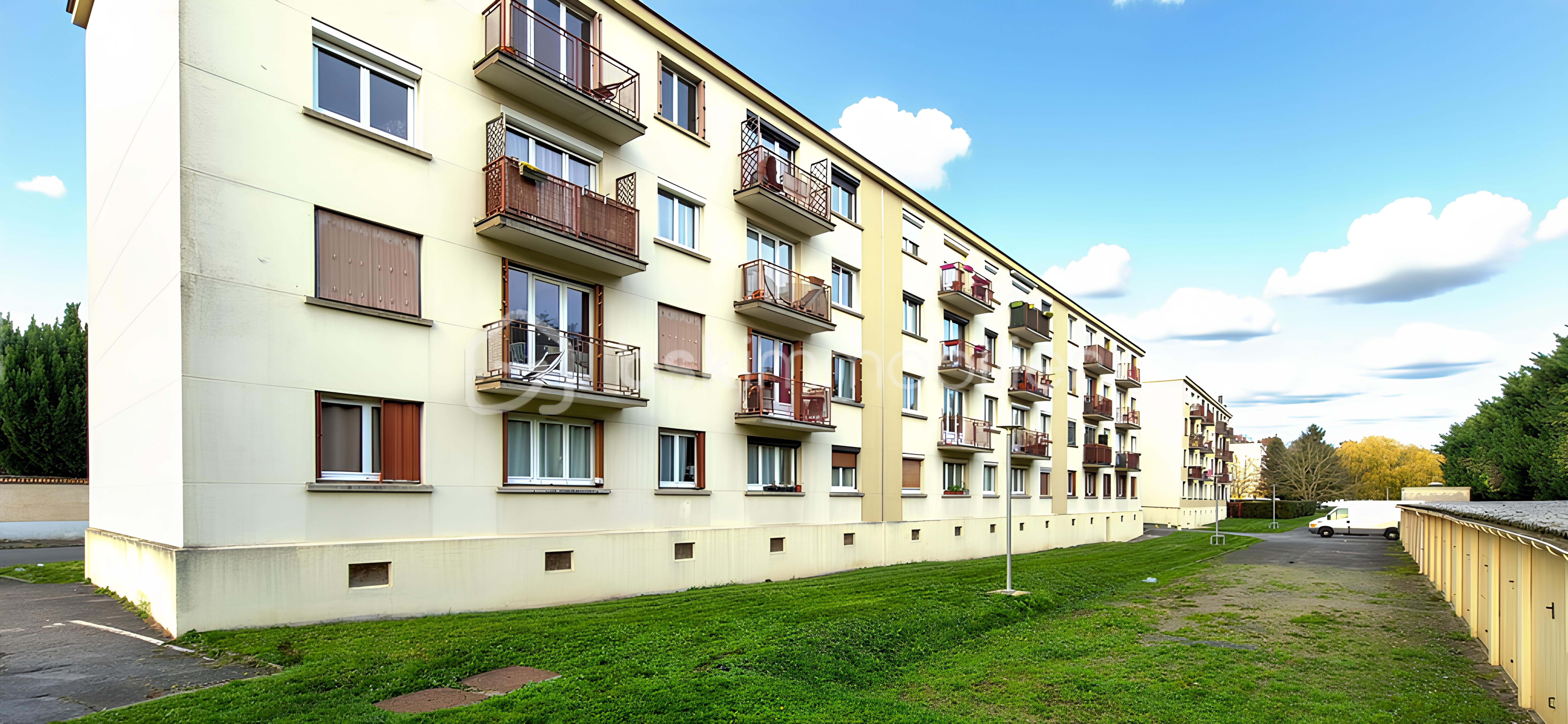 Appartement de 65,36 m² - 15b212cfa75e7a2-1.jpg