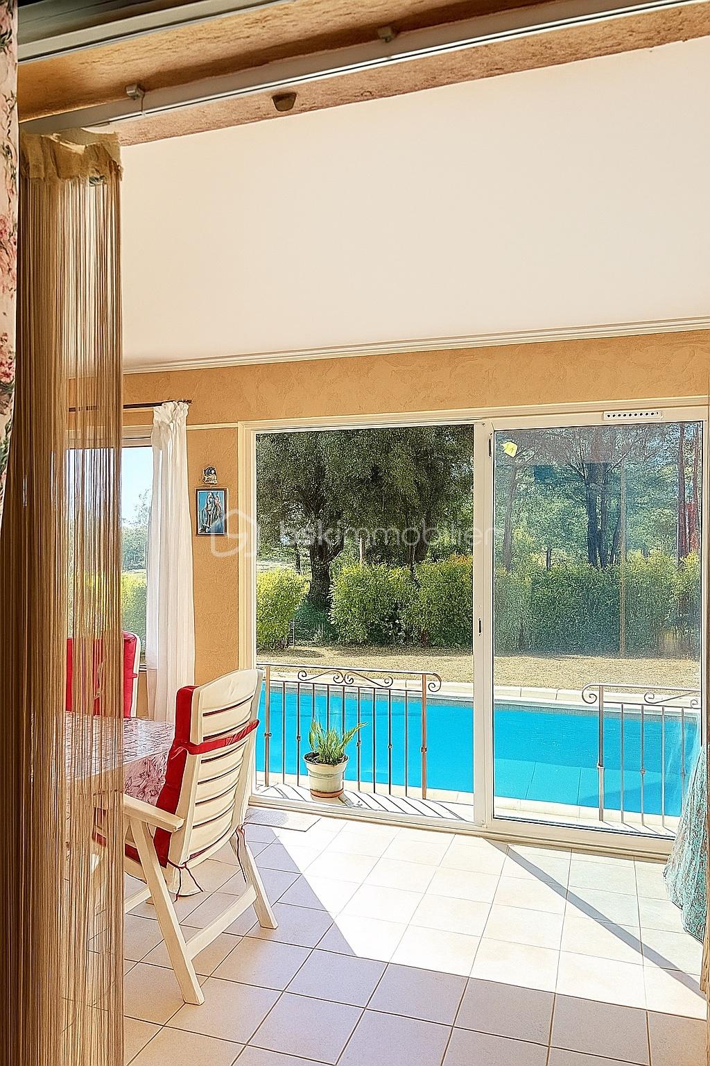 Maison de 126 m² - veranda piscine.jpg
