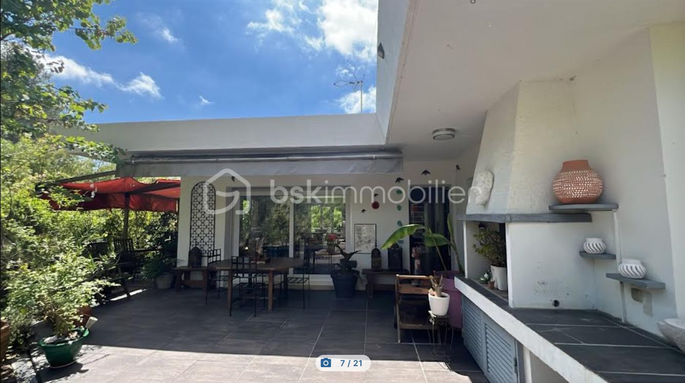 Maison de 140 m² - Terrasse cuisine d'ete.png