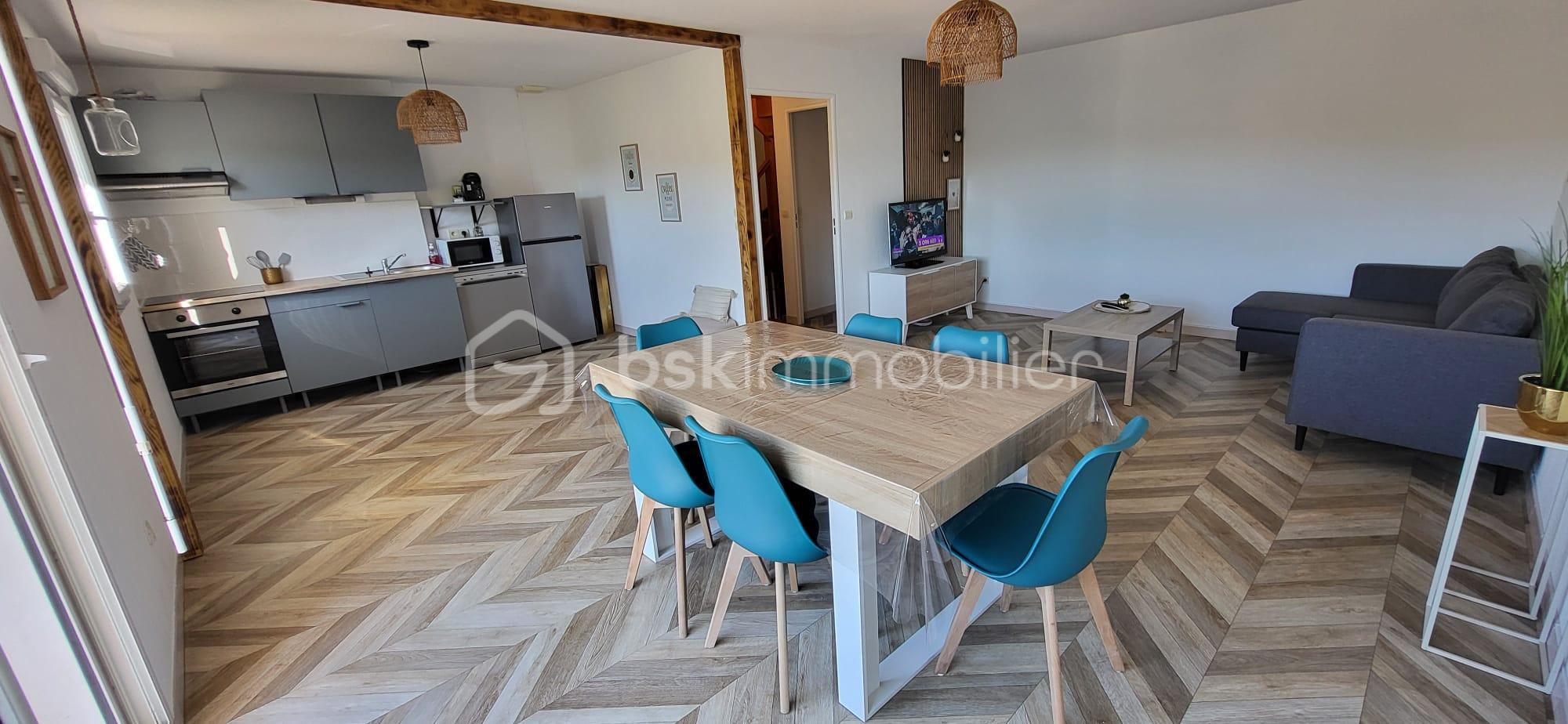 Maison de 82 m² - salon cuisine.jpeg