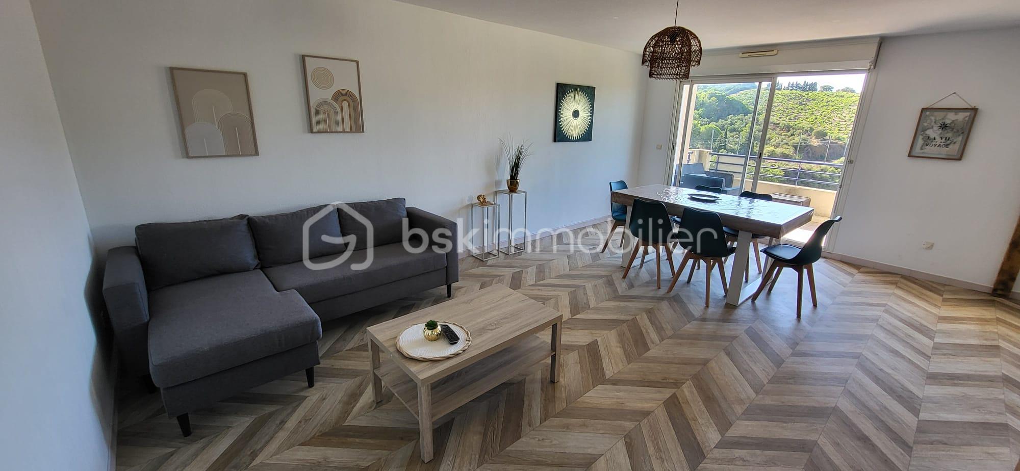 Maison de 82 m² - salon sejour terrasse.jpeg