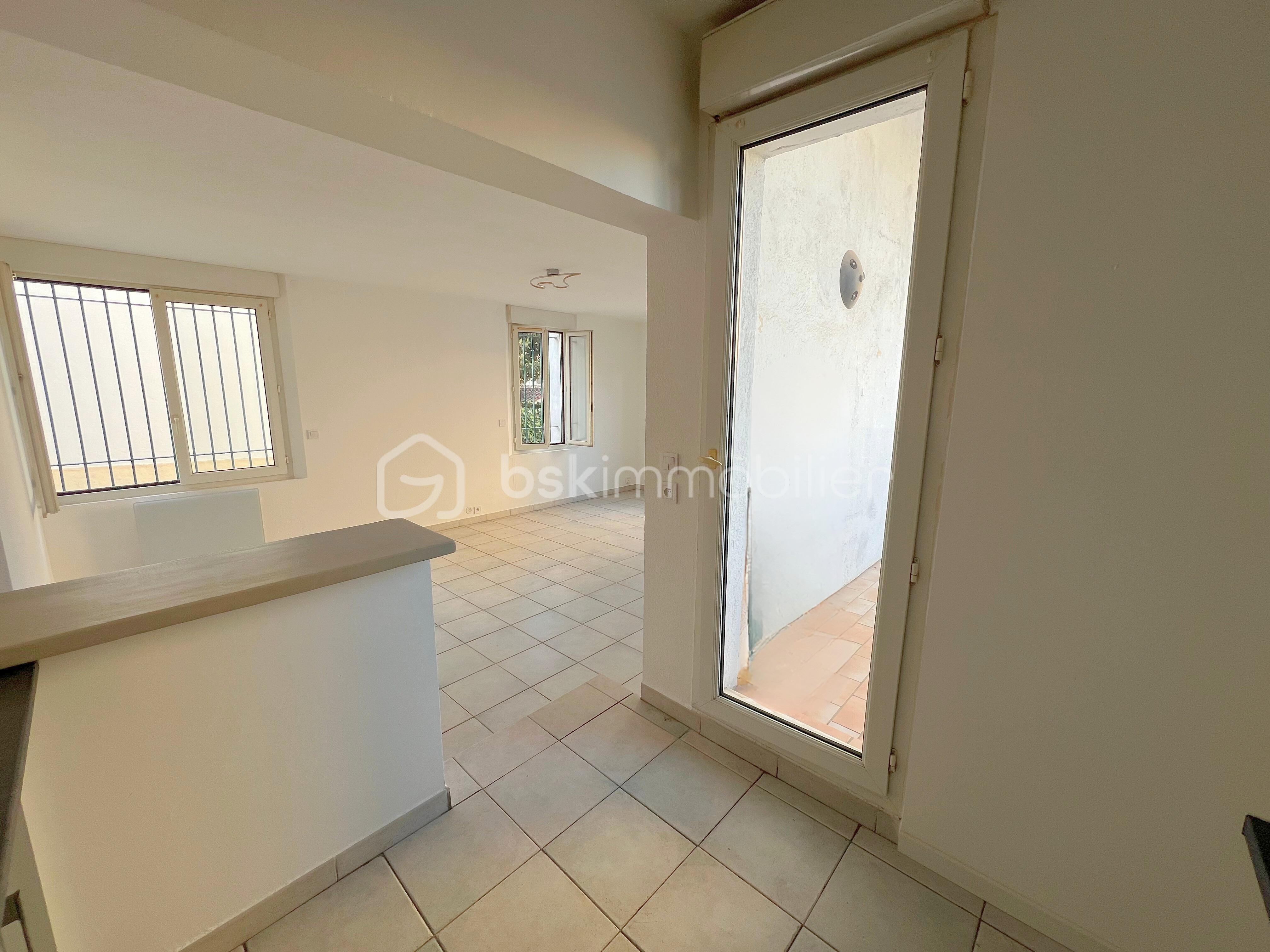 Appartement de 74 m² - cuisine-balcon.jpg