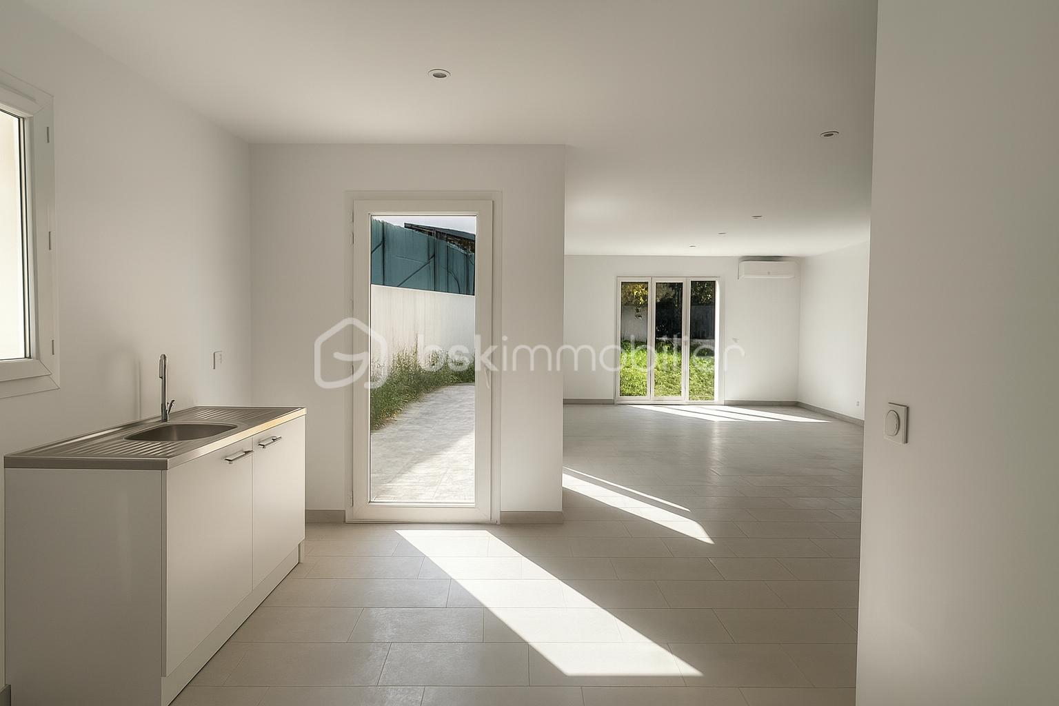 Maison de 99 m² - cuisine salon3.png
