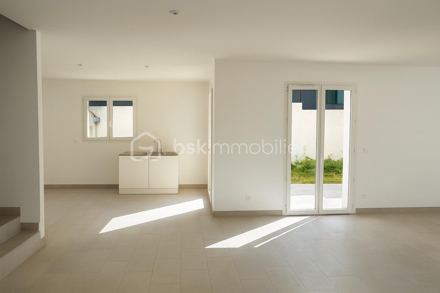 Maison de 99 m² - cuisine salon.png
