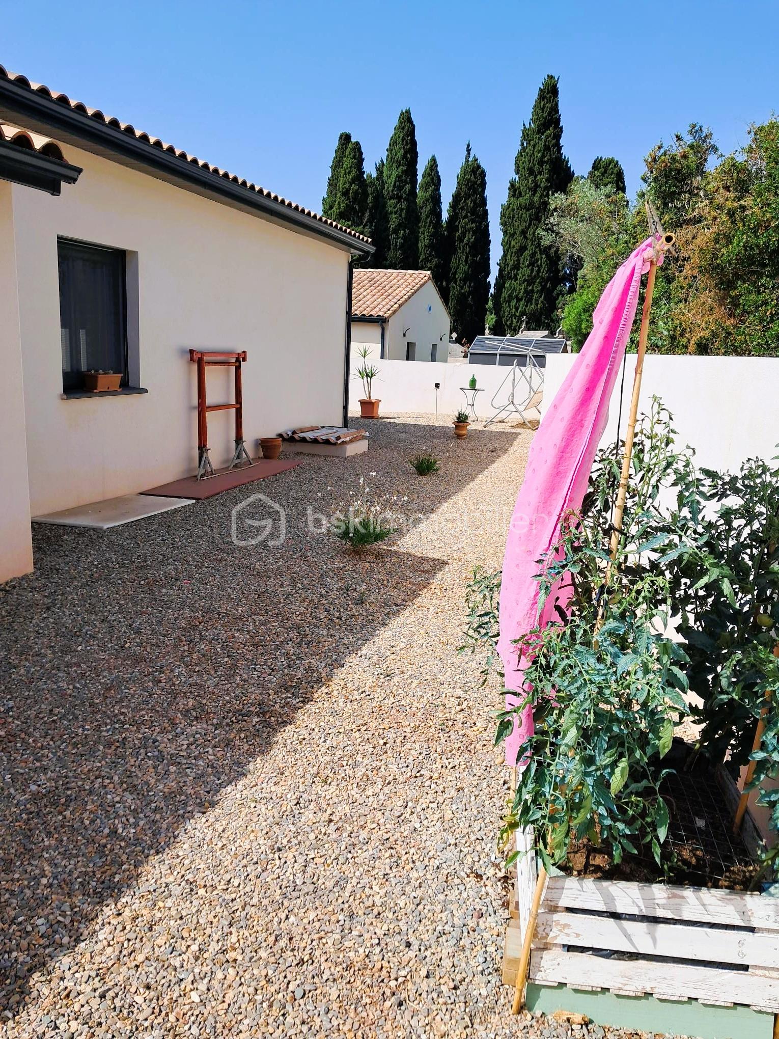 Maison traditionnelle de 59,42 m² - 13 - arrière maison.jpg