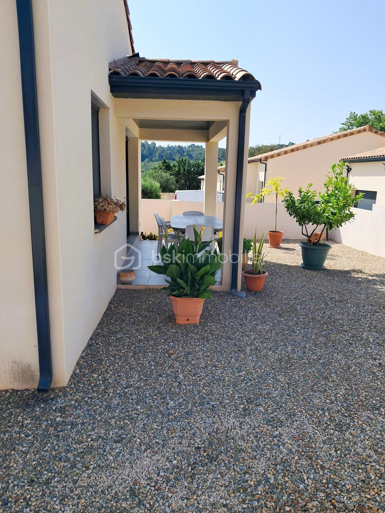 Maison traditionnelle de 59,42 m² - 14 - terrain.jpg