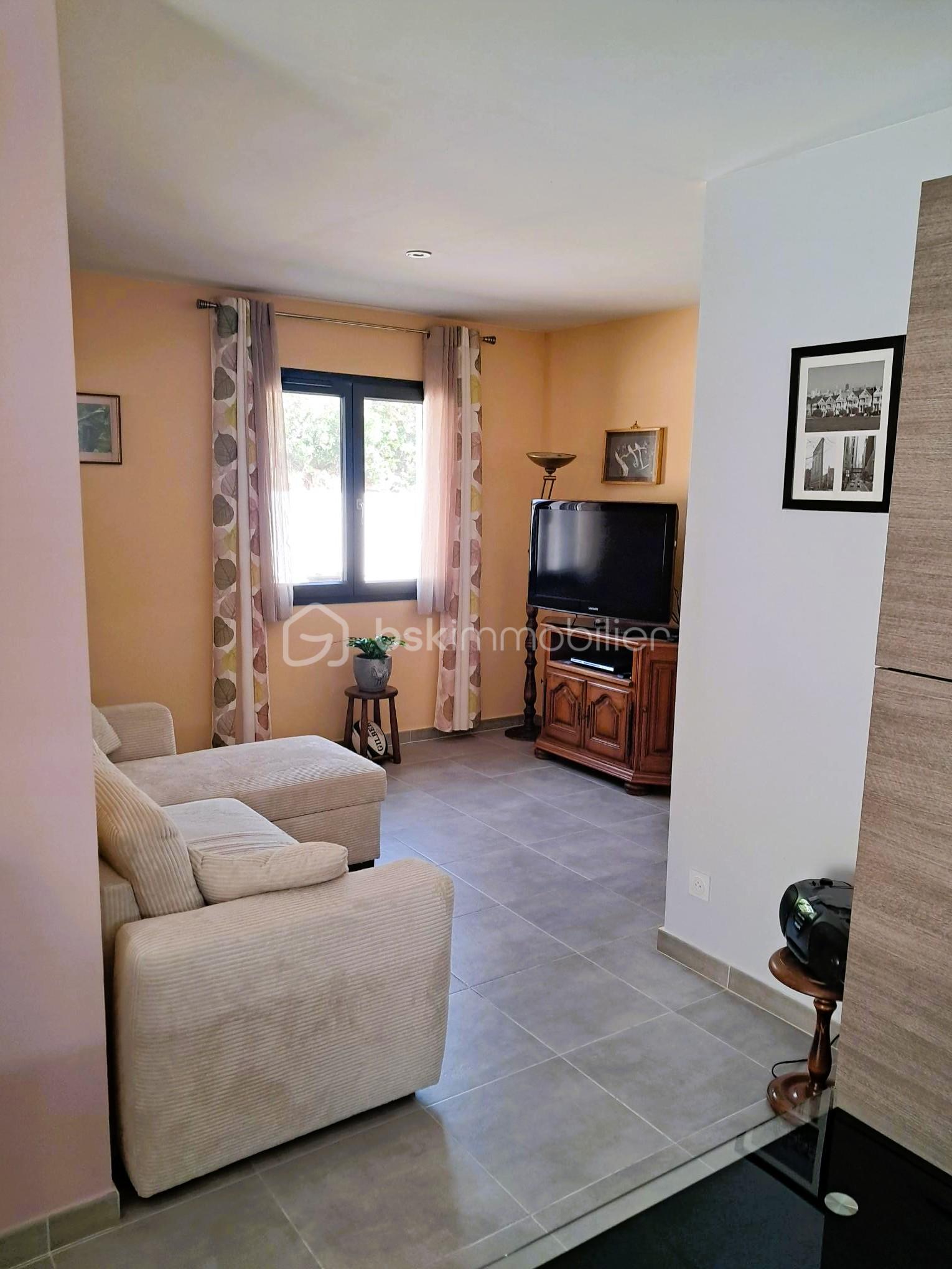 Maison traditionnelle de 59,42 m² - 07 bis - salon.jpg