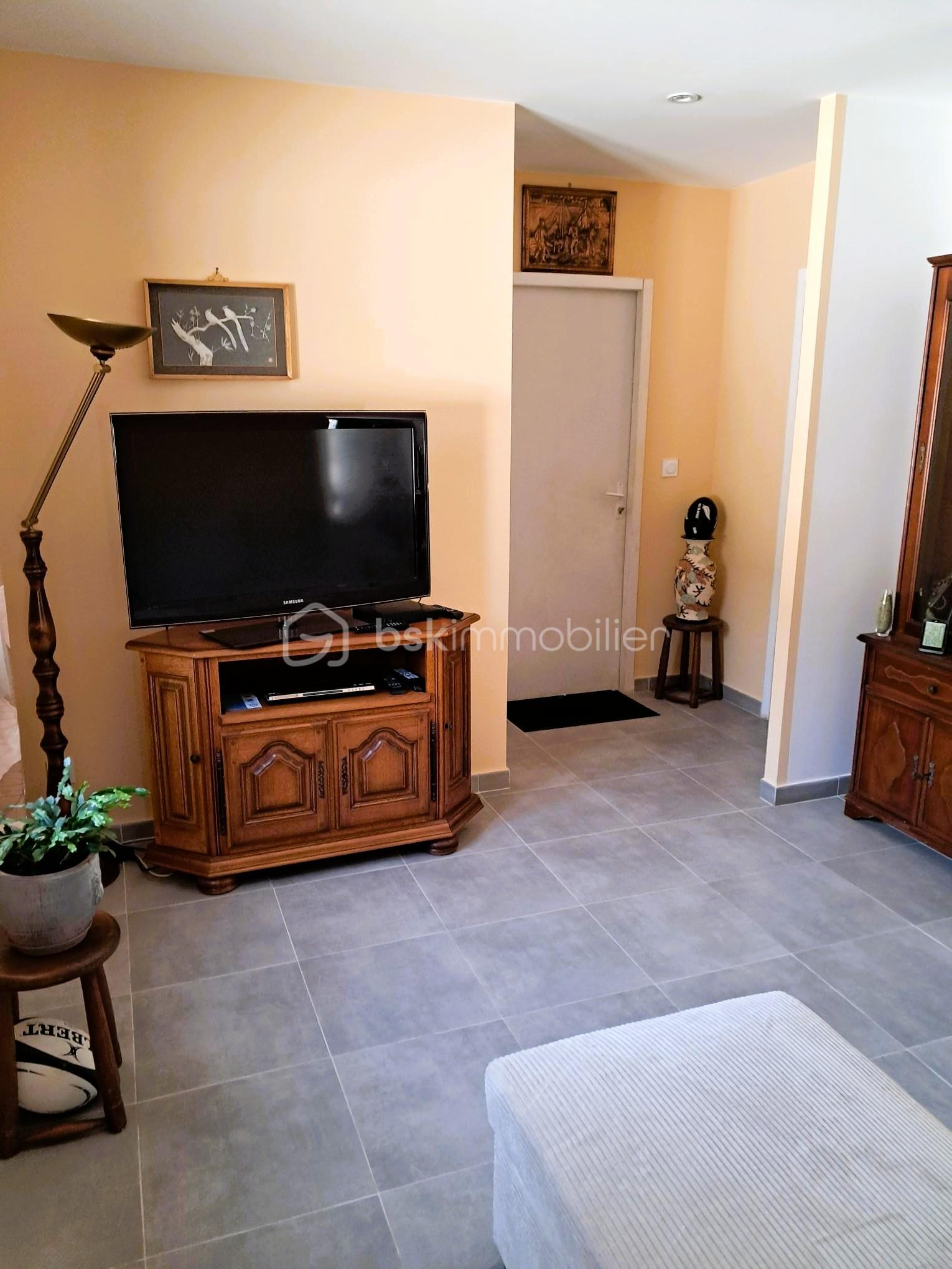 Maison traditionnelle de 59,42 m² - 07 - salon.jpg