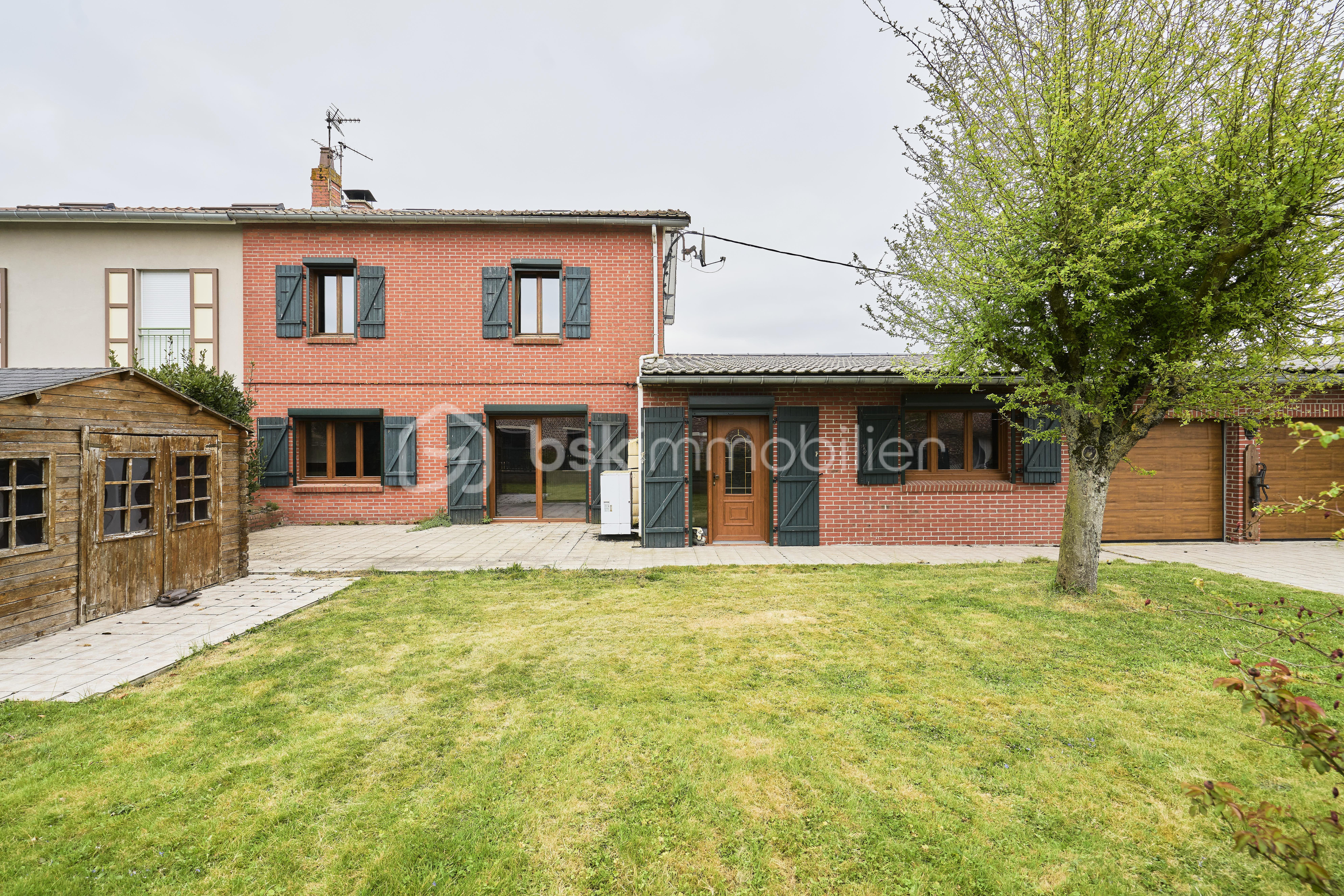 Maison de village de 100 m² - extÇrieur g.jpg