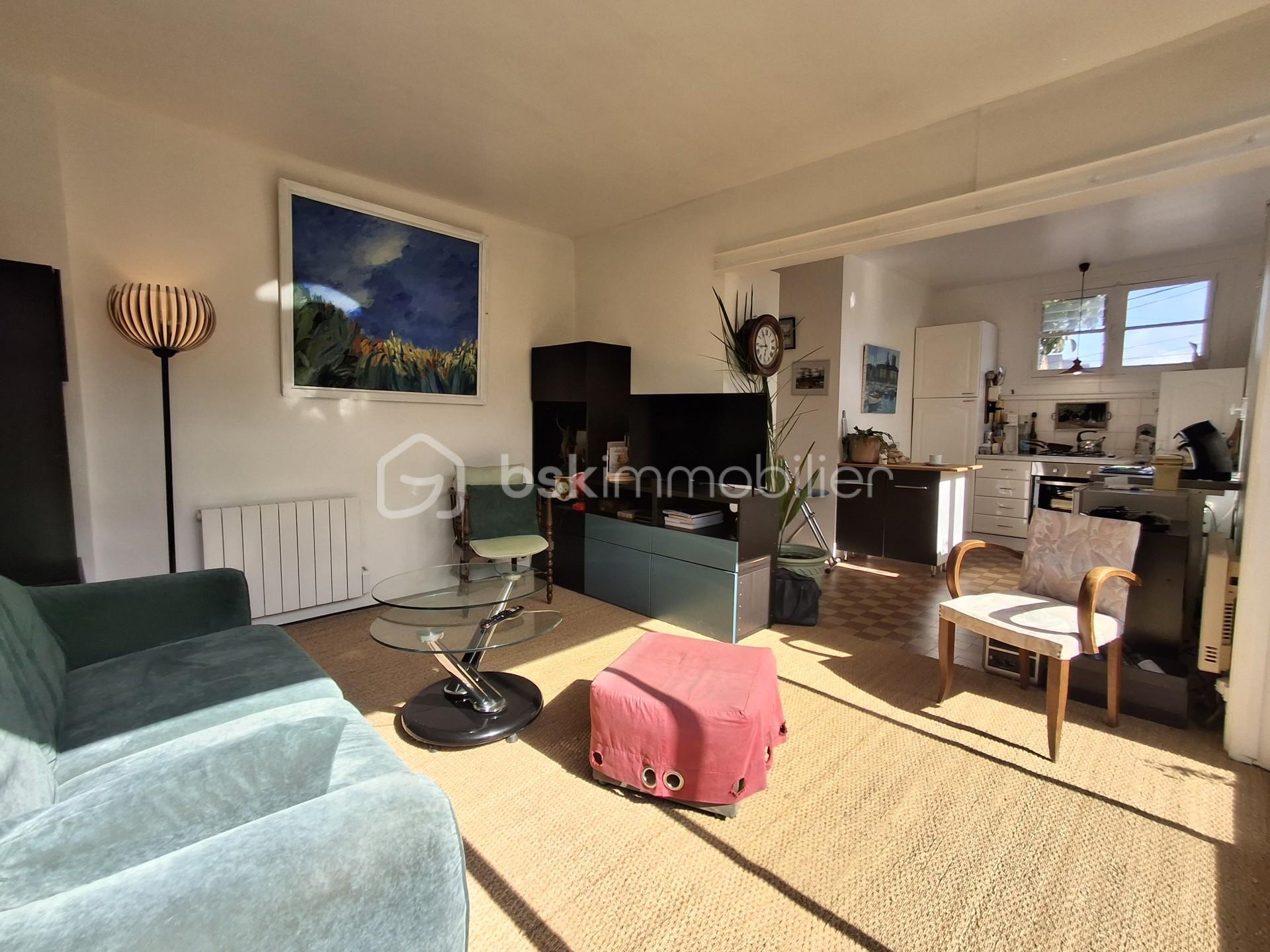 Maison de 40 m² - salon vers cuisine paysage.jpg