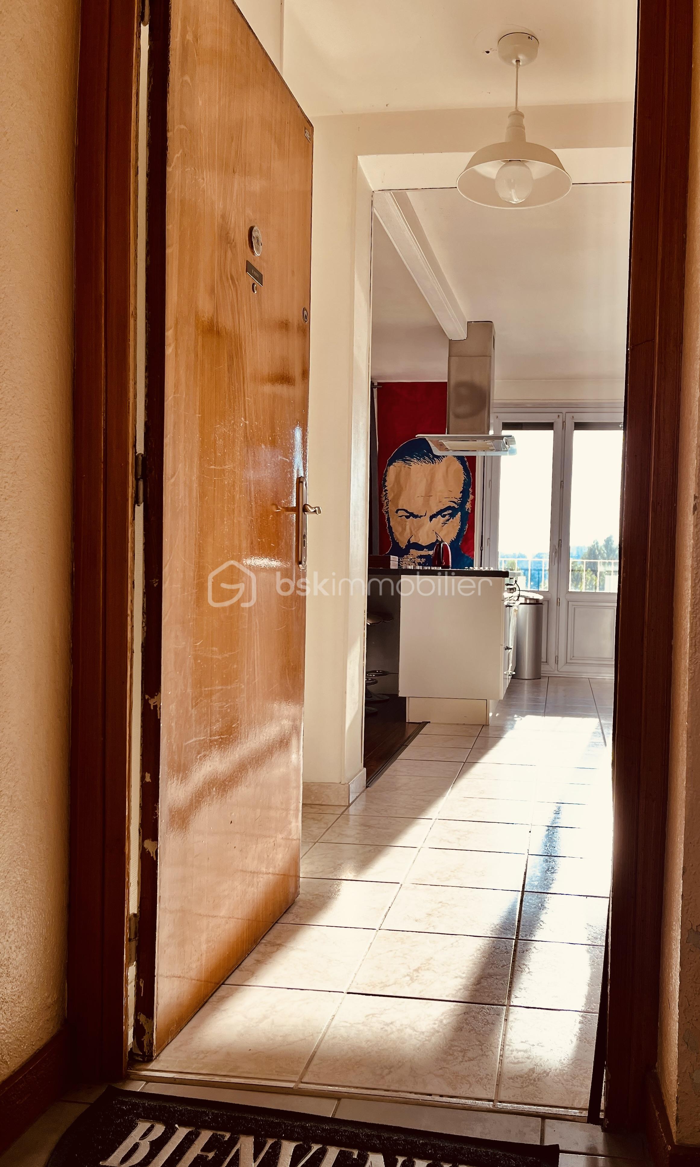 Appartement de 65,45 m² - 1-porte d'entrée Bienvenue.jpeg