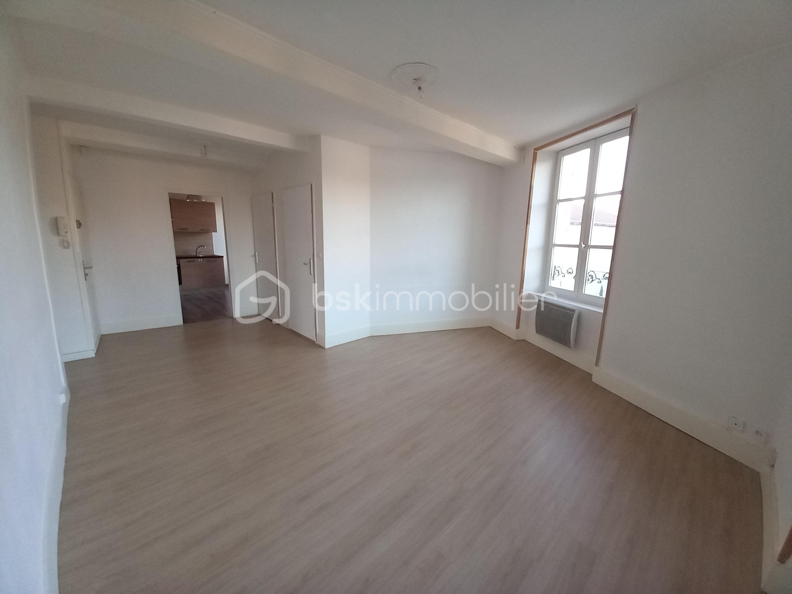 Appartement de 80 m² - Appartement SESG 4 Rte de St Marcellin Photo Salon 2.jpg
