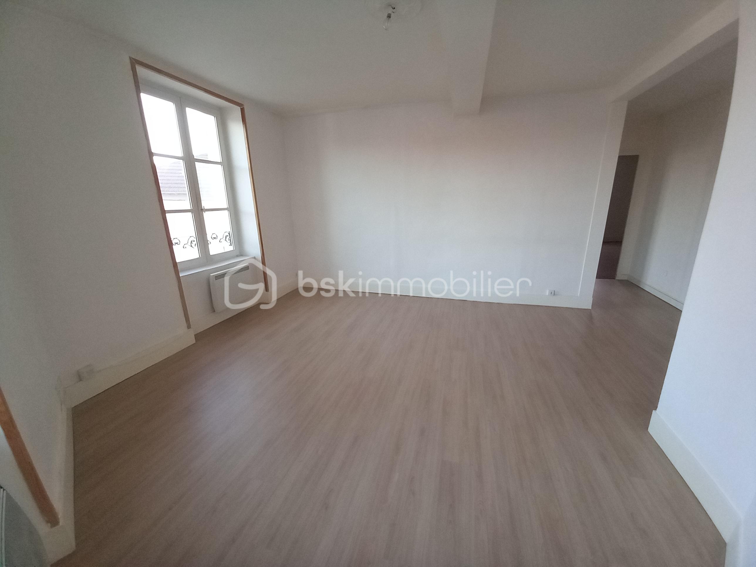 Appartement de 80 m² - Appartement SESG 4 Rte de St Marcellin Photo Salon 3.jpg