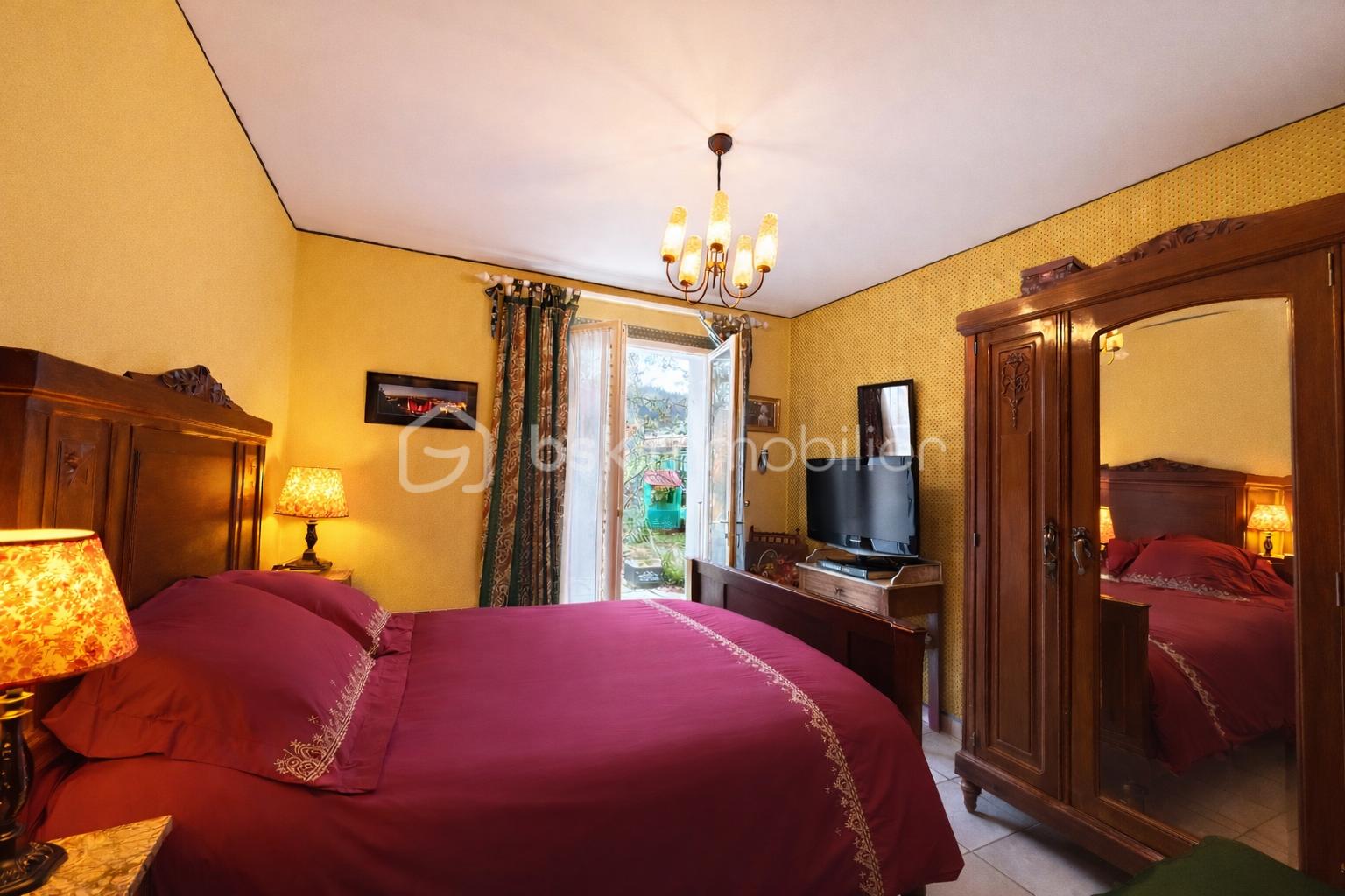 Chambre chaleureuse avec vue sur jardin.png