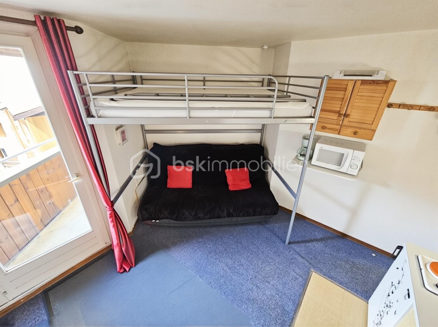 Appartement de 15 m² - salon studio allos.png