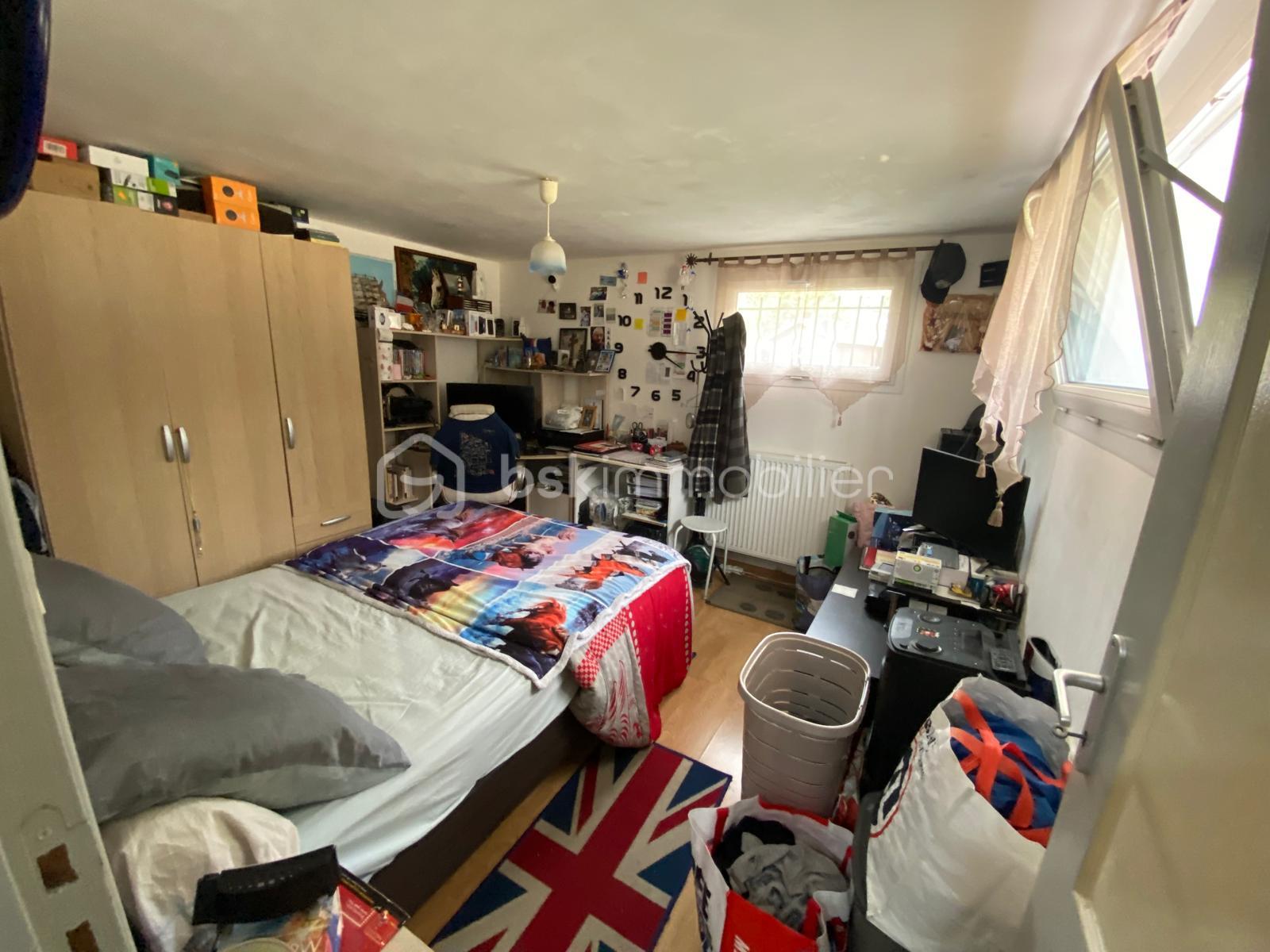 Maison de 125 m² - chambre 1 sous-sol.jpg