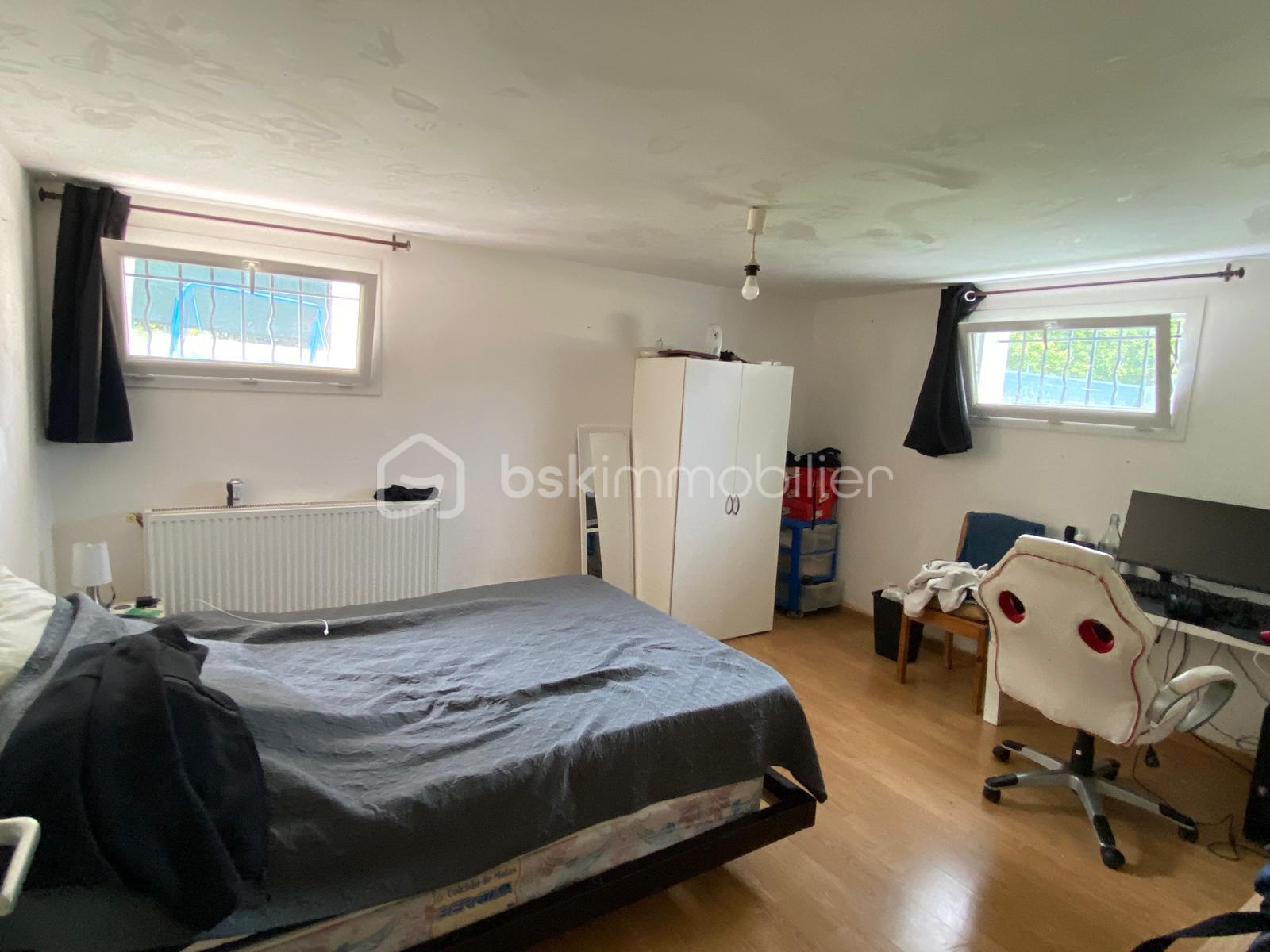 Maison de 125 m² - chambre 2 sous-sol.jpg