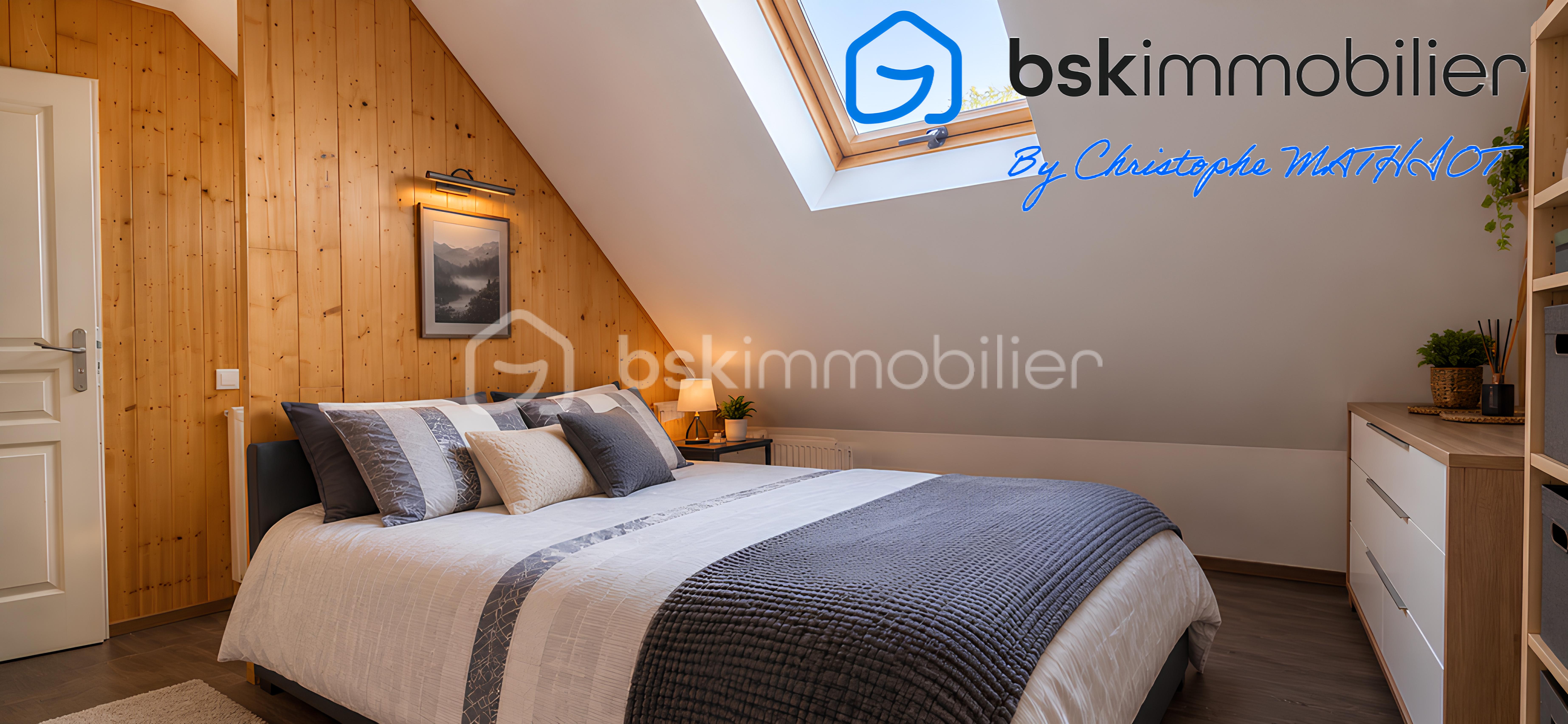 Chambre mansardée chaleureuse et ordonnée.png