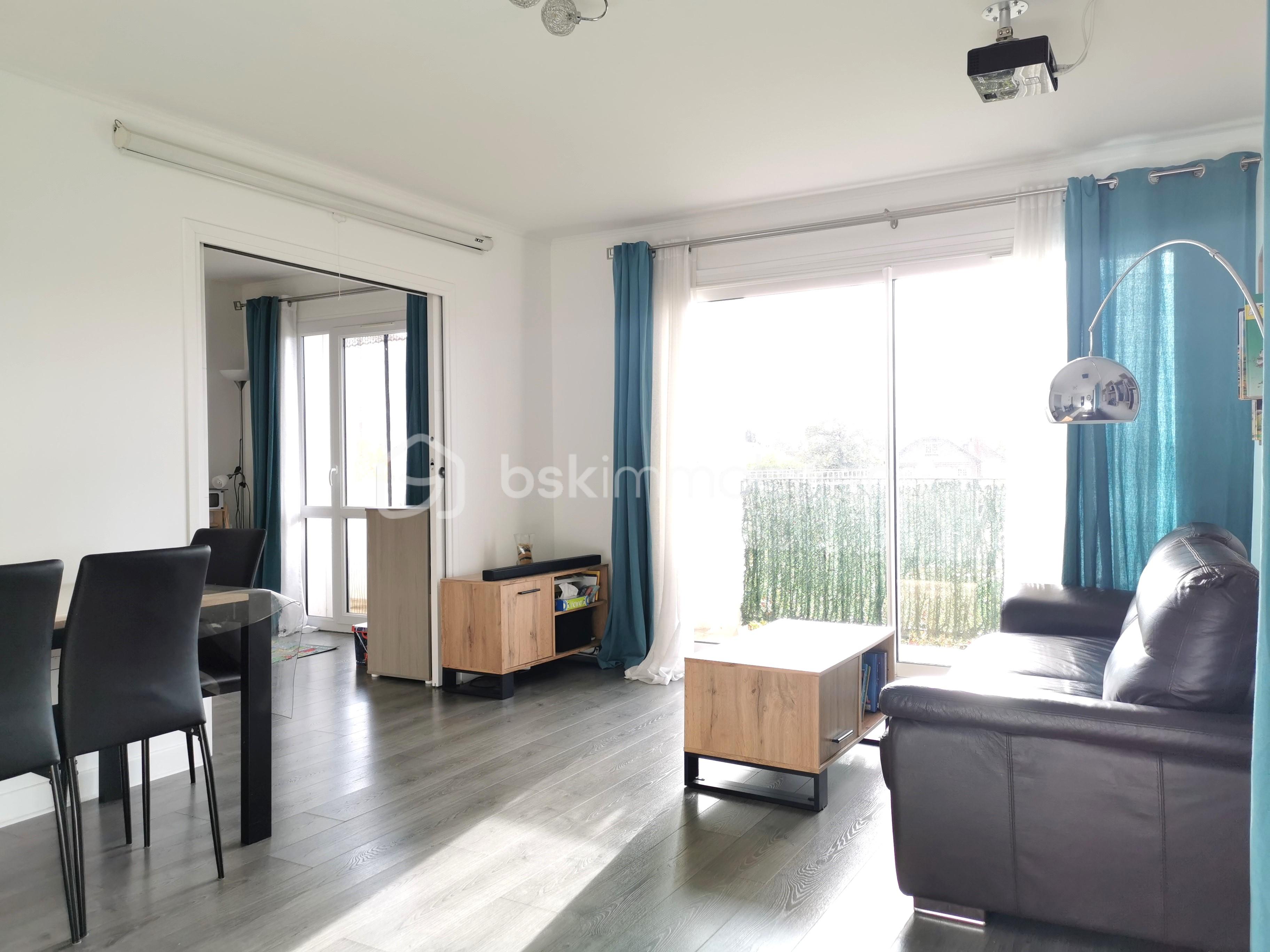 Appartement de 89,50 m² - 5-SEJOUR PORTES OUVERTES.jpg