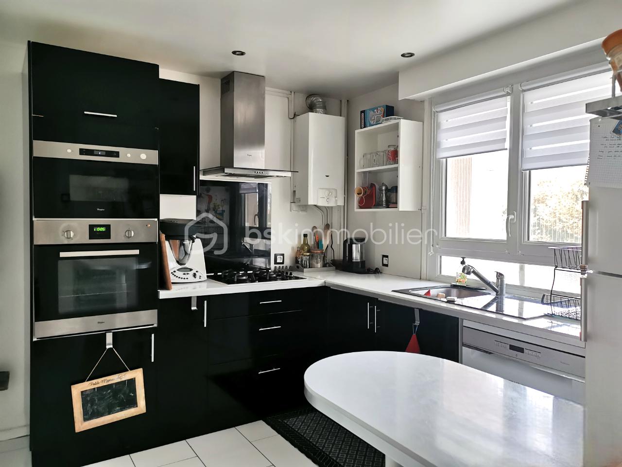 Appartement de 89,50 m² - 6-CUISINE 1.png