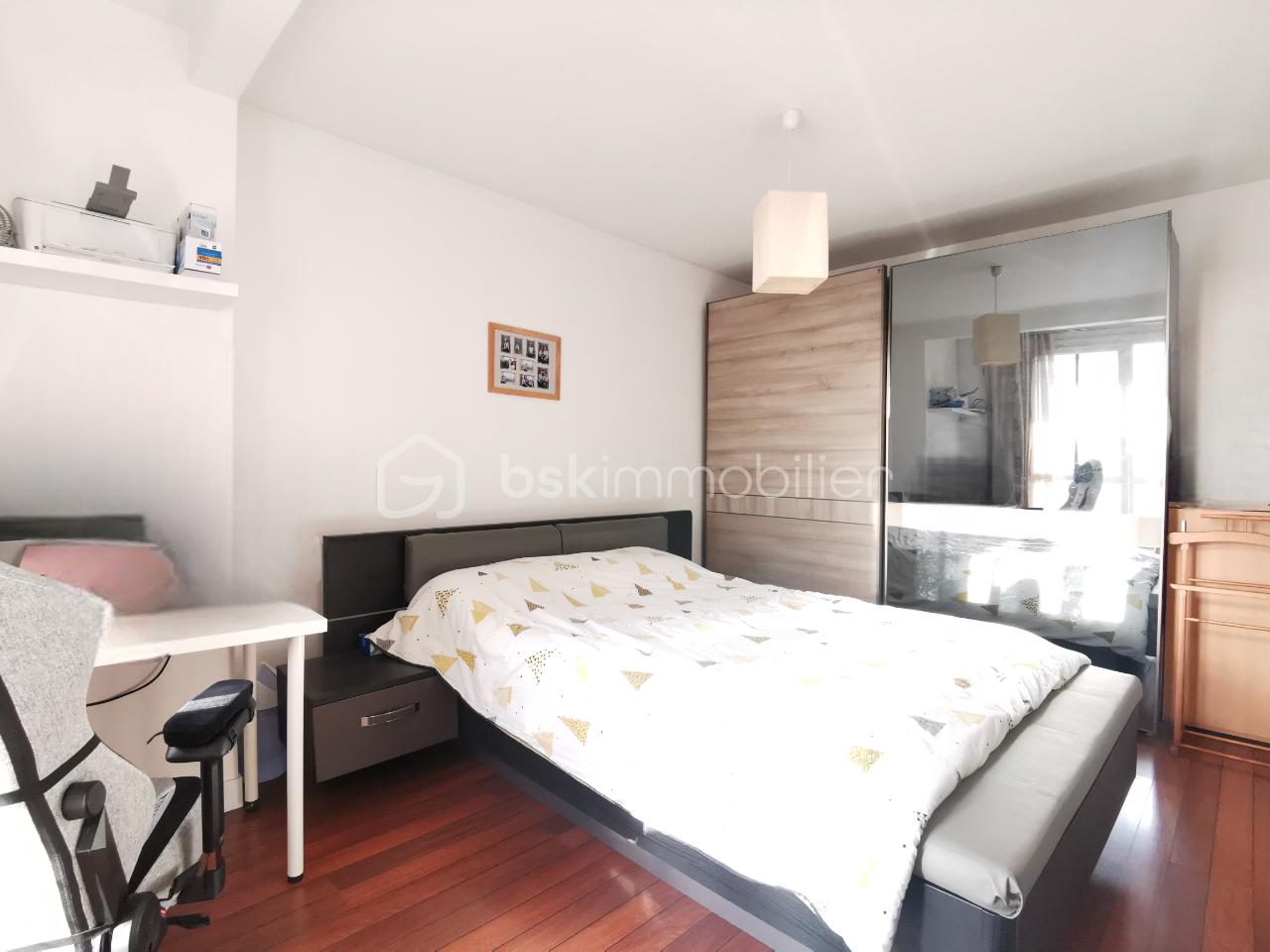 Appartement de 89,50 m² - 9-CHAMBRE PARENTS.png