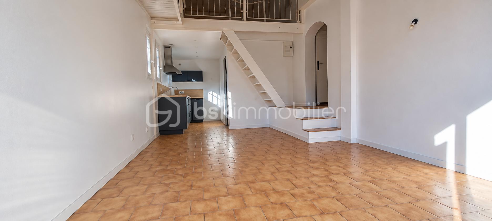 Loft lumineux aux tomettes chaleureuses (1).png