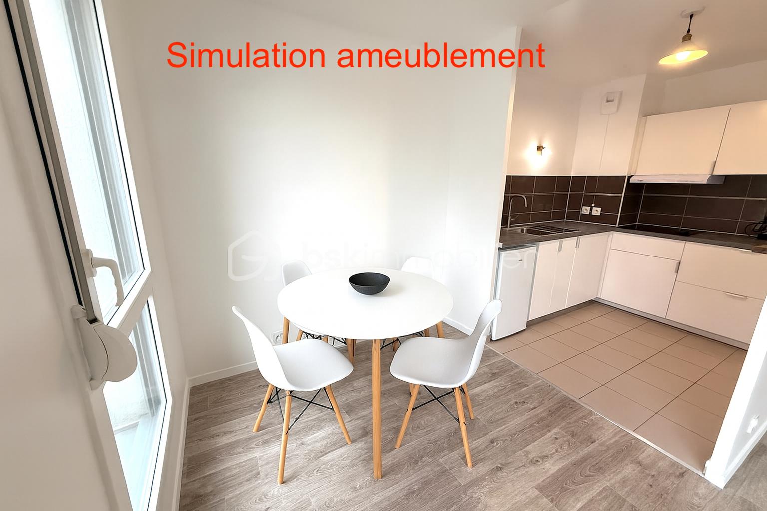 Appartement de 44 m² - coin repas meublé.png