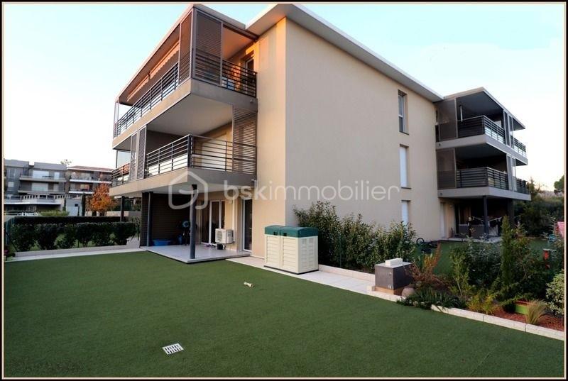Appartement de 42 m² - colson jardin et batiment.jpg