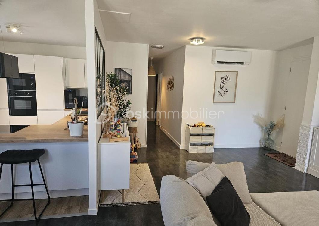 Maison de 110 m² - Salon cuisine.png