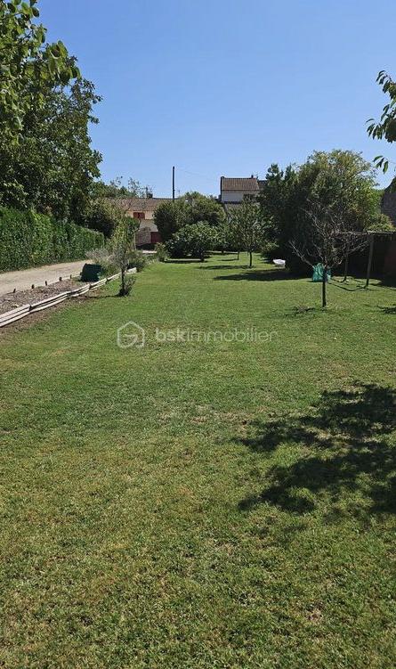 Maison de 110 m² - Terrain devant.png