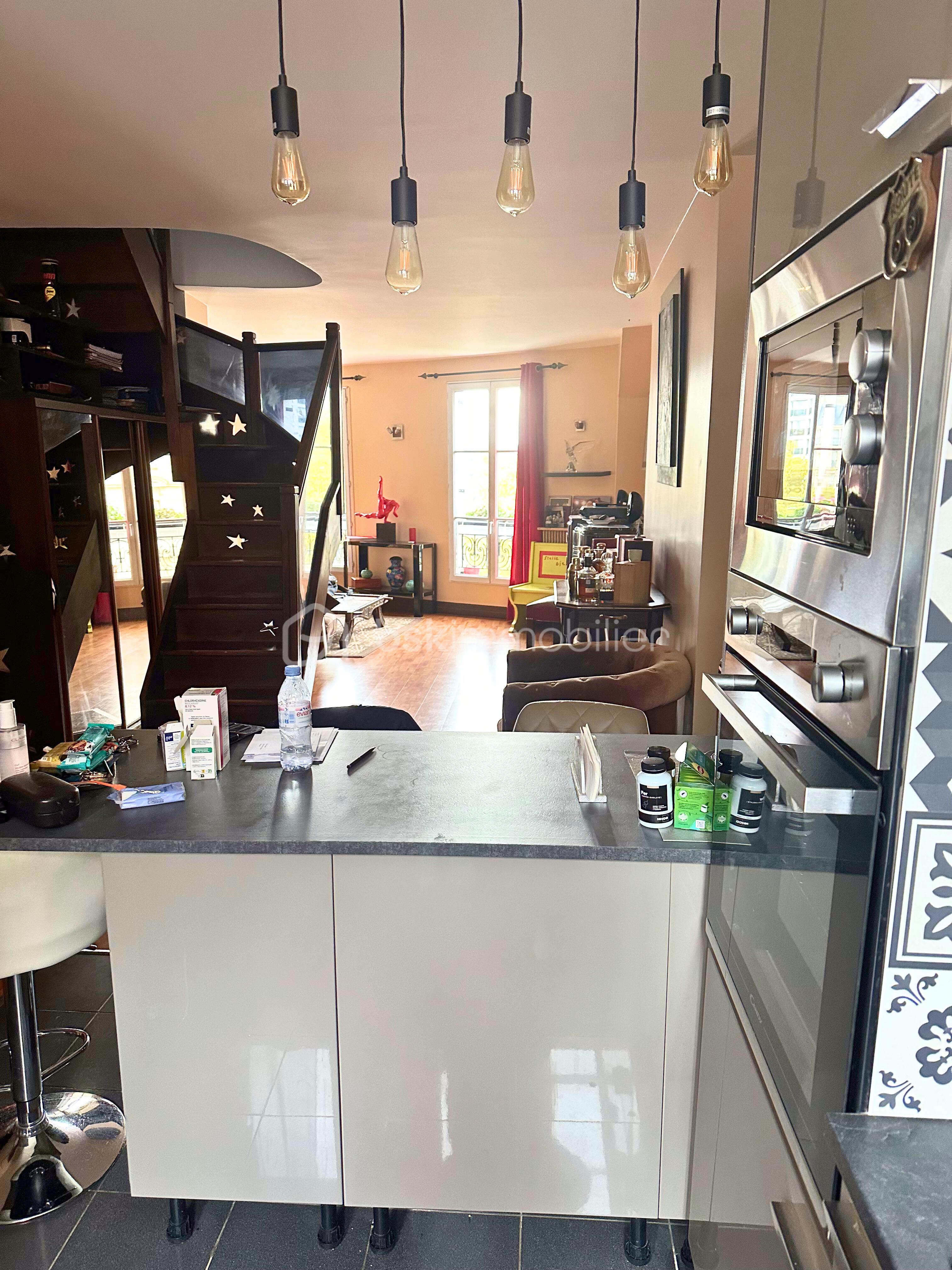 Duplex de 102,19 m² - photo salon cuisine.jpg