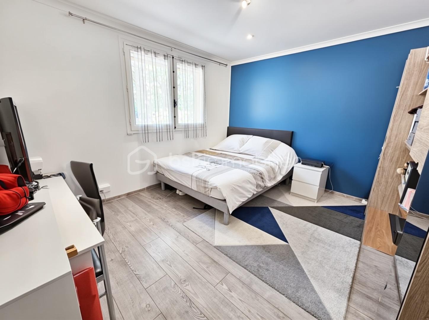 Maison de 200 m² - chambre 1.png