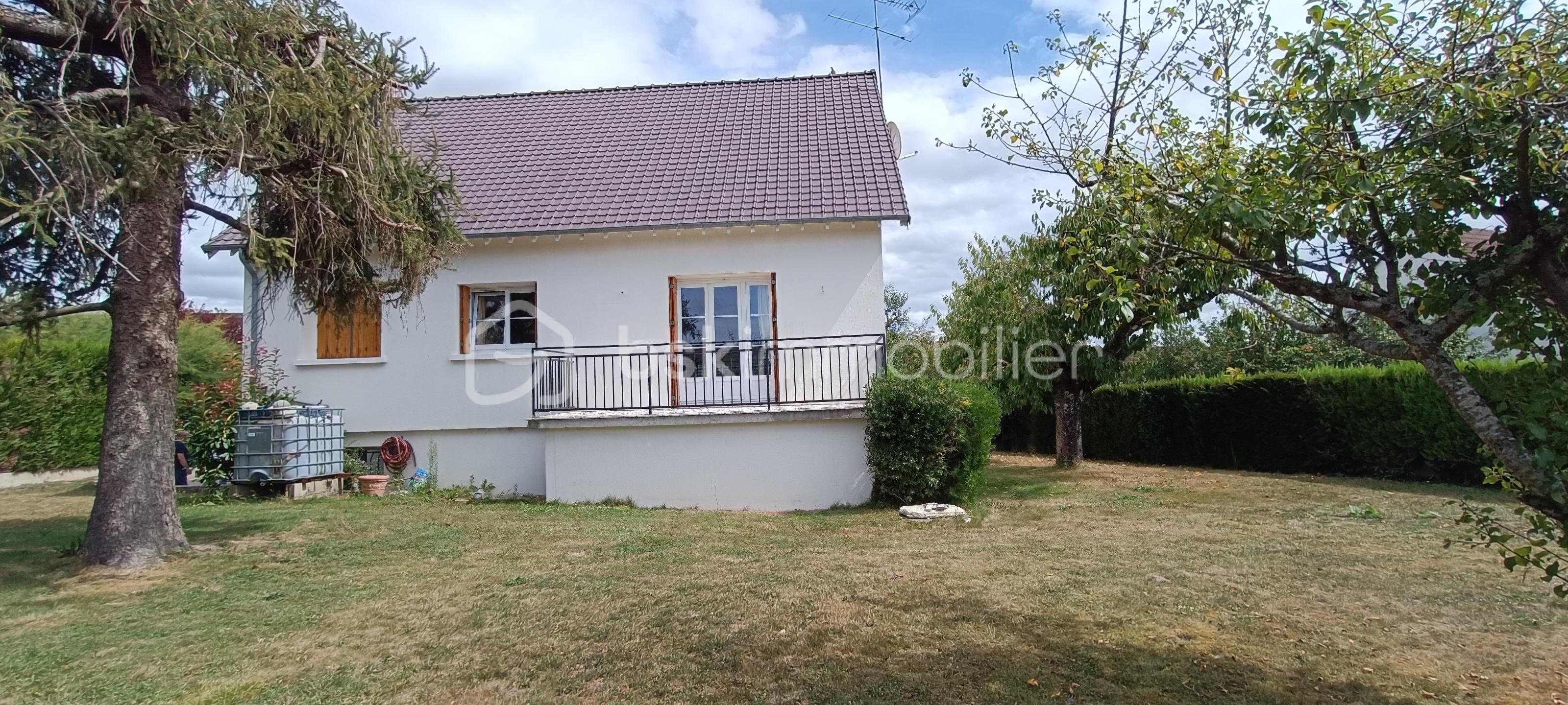 Maison traditionnelle de 130 m² - Arrière maison.jpg