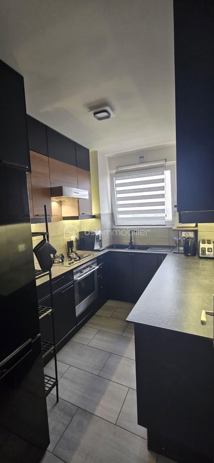 Appartement de 58,65 m² - 5e2943cd-84ae-4cfd-8190-0e8ce9f6ce87.jpeg