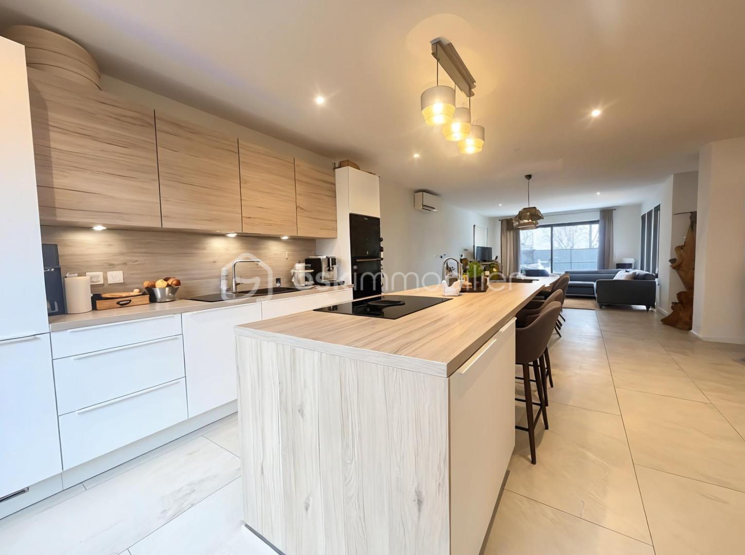 Maison de 140 m² - 7b097e59a56654a-1.jpg