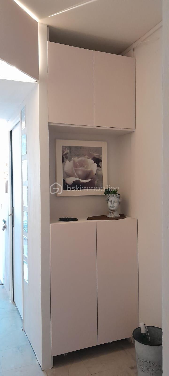 Appartement de 78,70 m² - meuble couloir.jpg