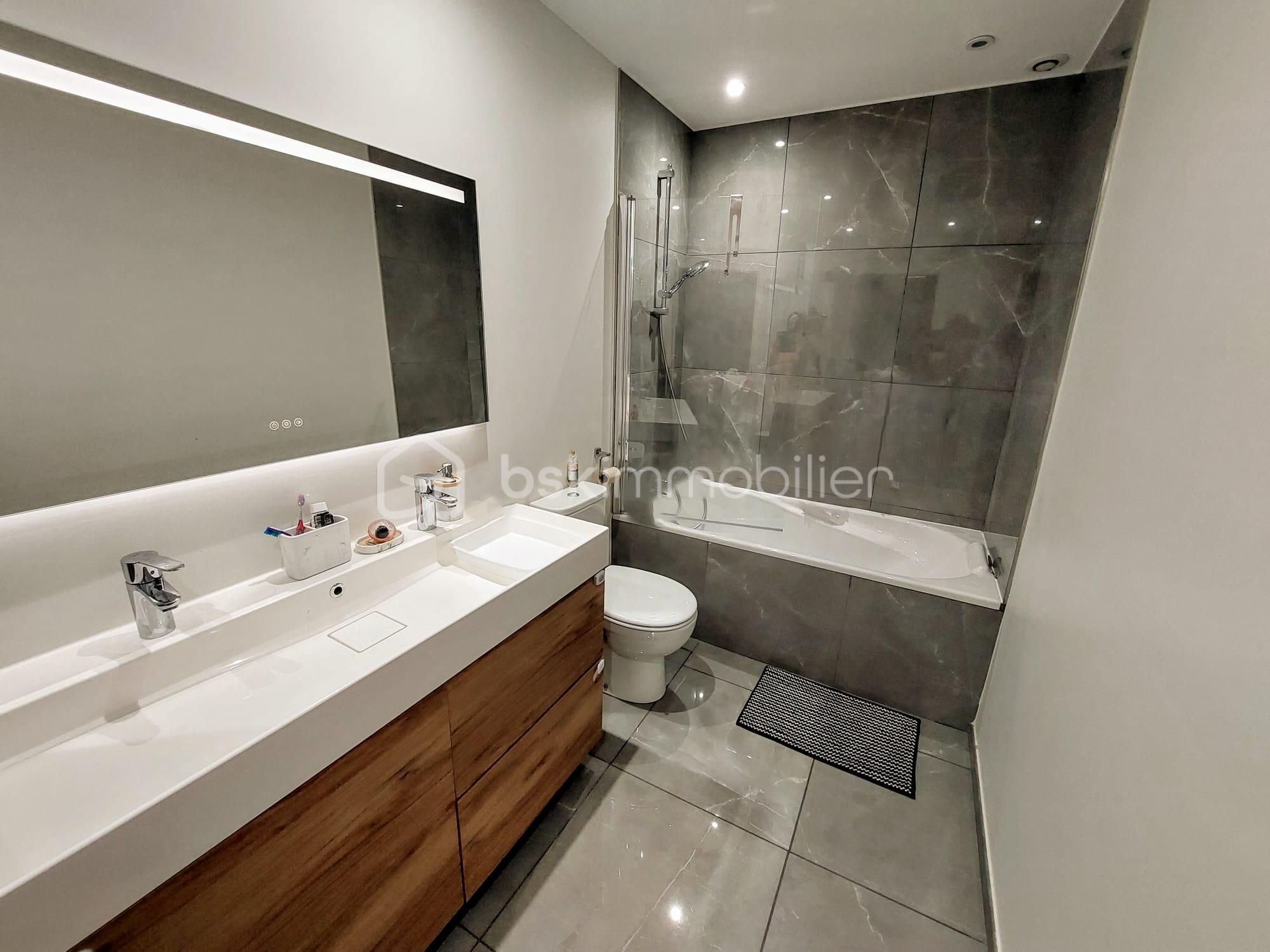 Appartement de 104,91 m² - Salle de bains.jpeg