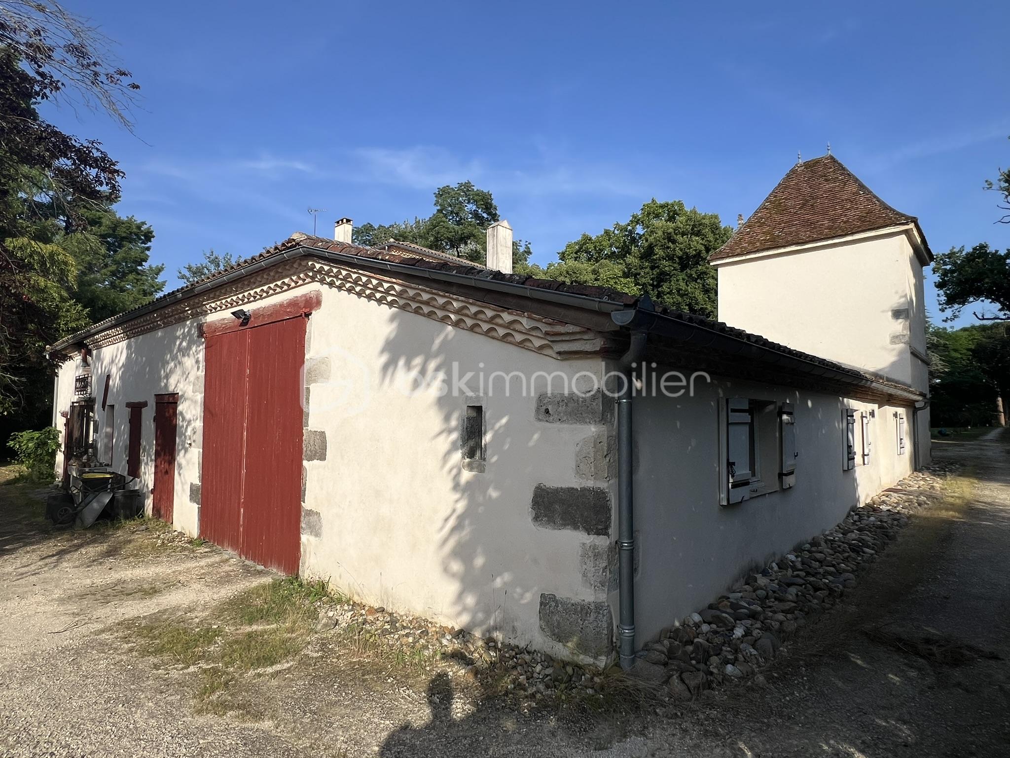 10-LE SINANGE_Dos façade nord.JPEG