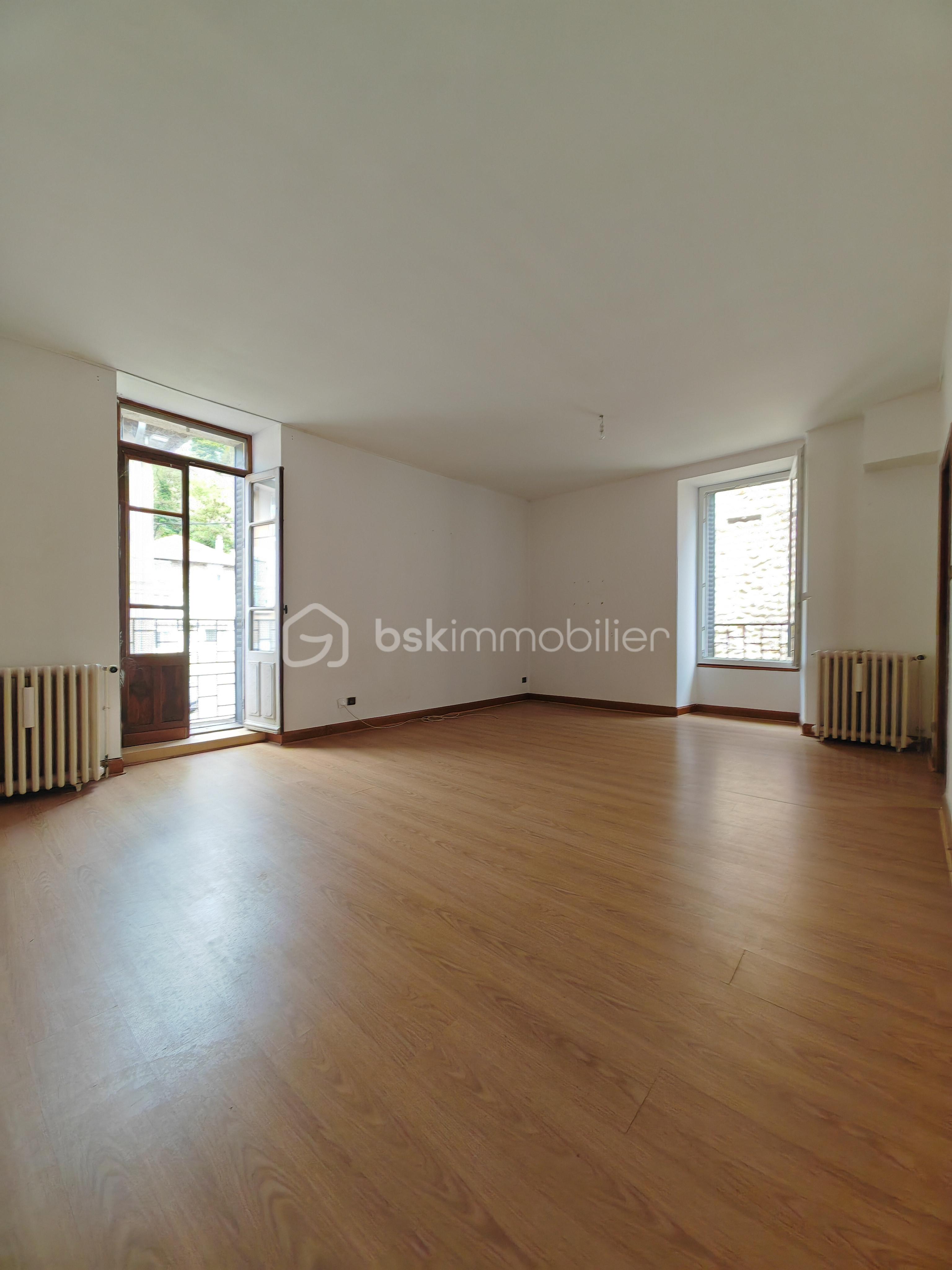 Maison de 153 m² - salon balcon.jpg