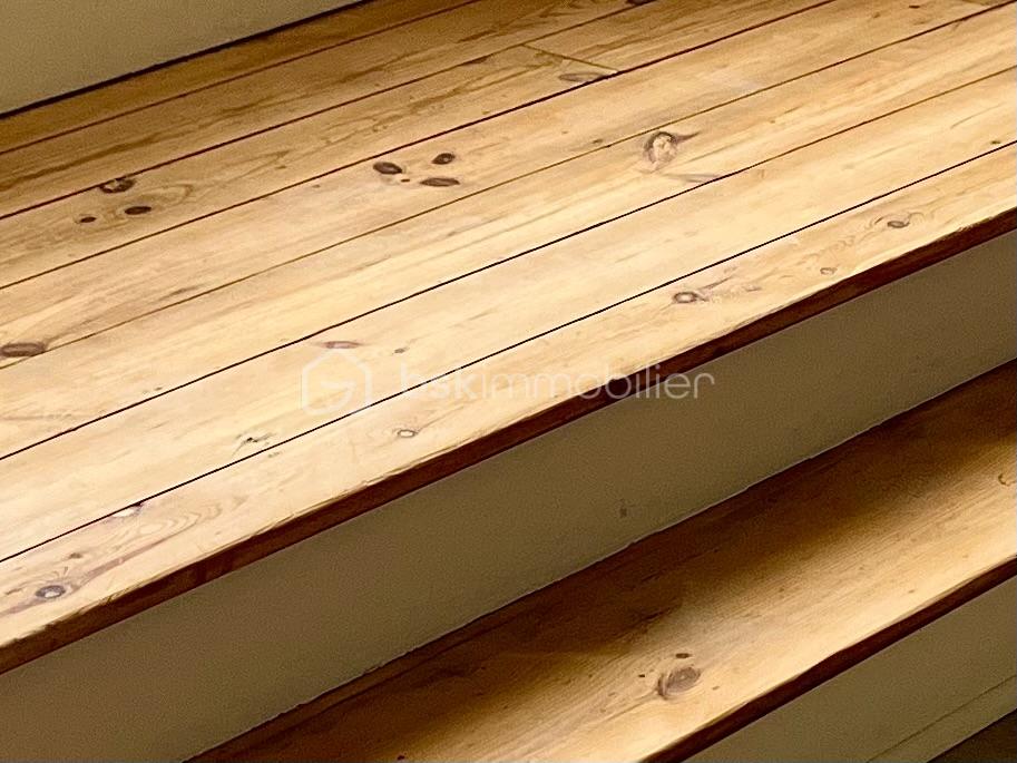 Appartement de 71,50 m² - buret 1 sol bow window.jpg