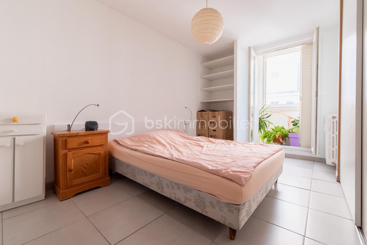 Appartement de 76,65 m² - Chambre-1-1.jpg