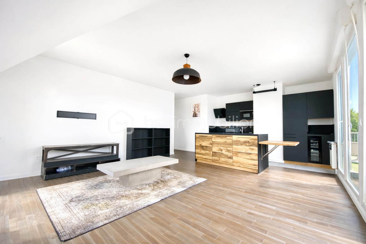 Appartement de 53,60 m² - SÉJOUR ANGLE TERRASSE.png