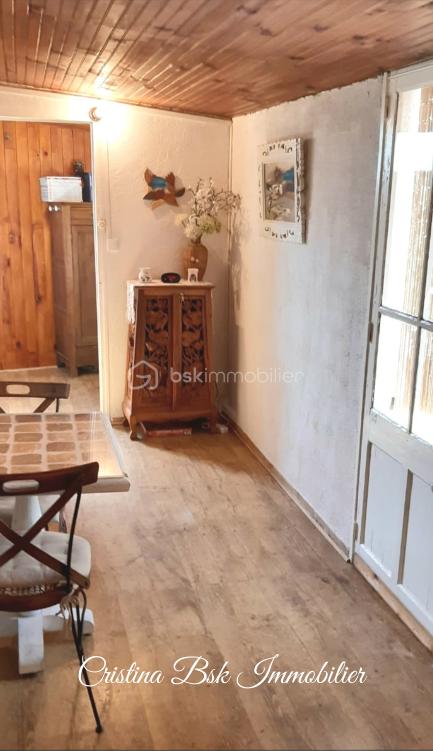 Maison de 38 m² - accès au pièces ext et salon text bas .png