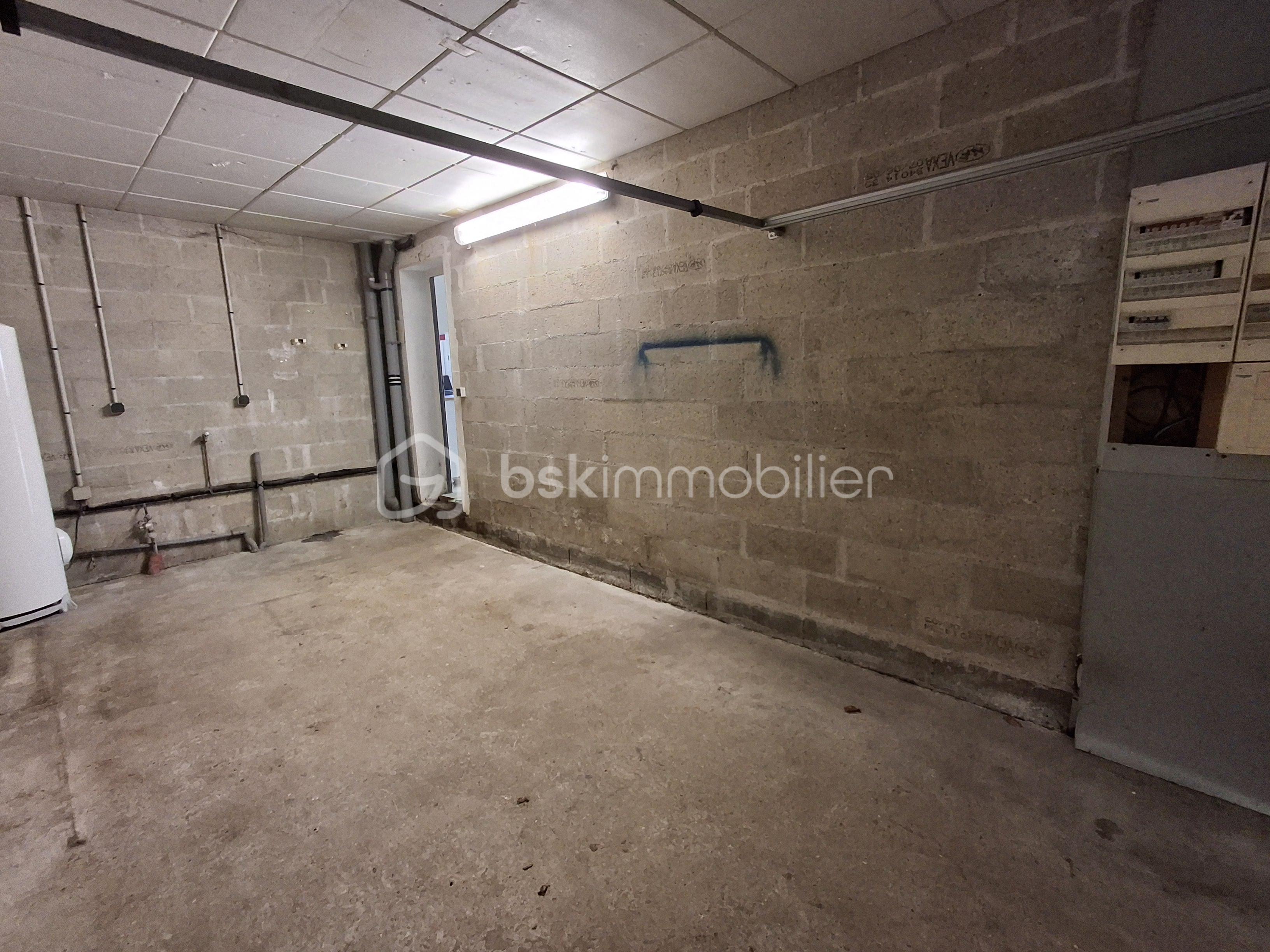 Maison de 125 m² - Garage et tableau élec paysage.png