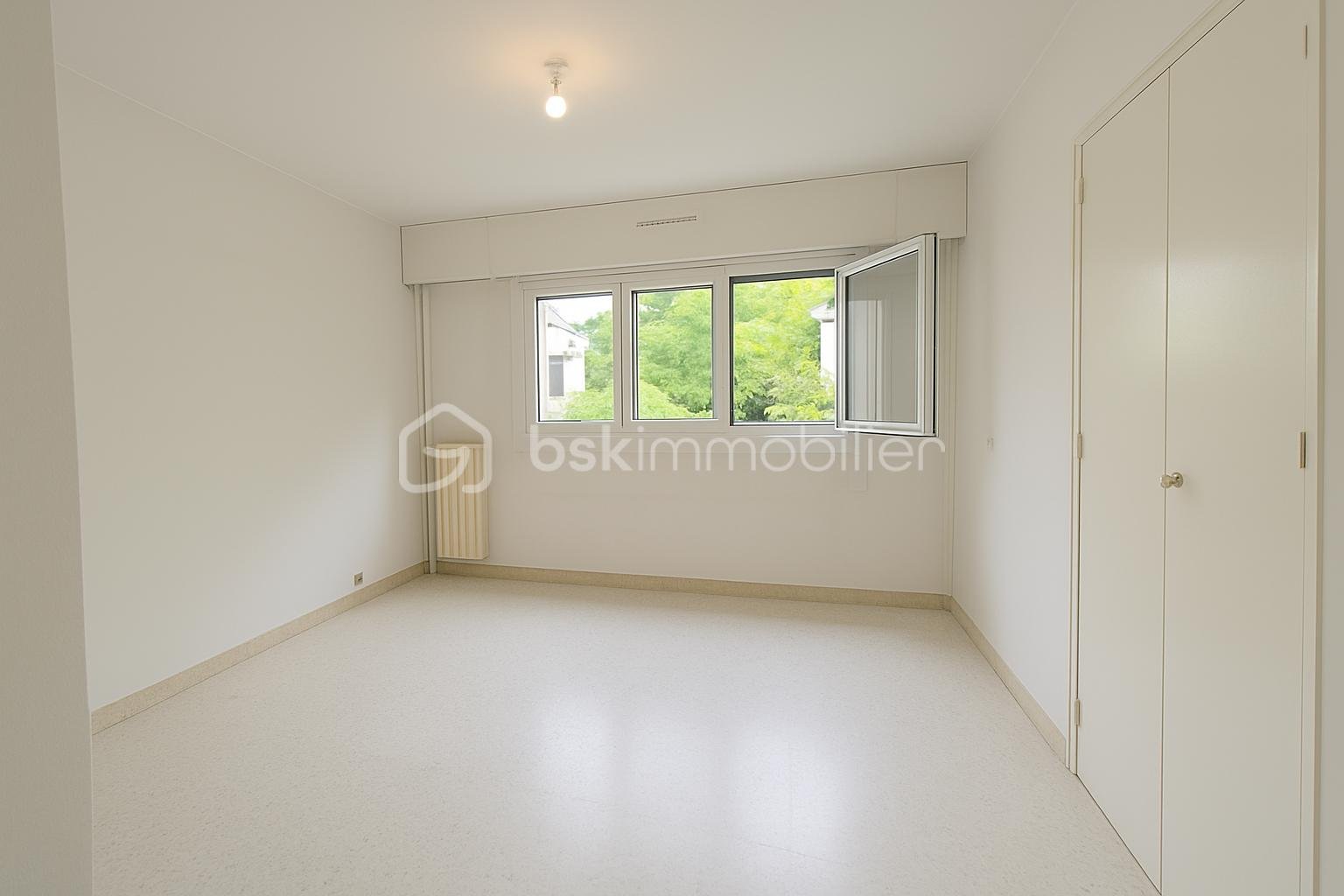 Appartement de 75,70 m² - chambre 2 pub.png