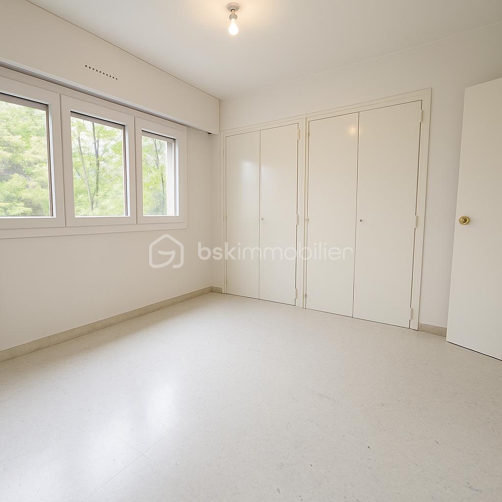 Appartement de 75,70 m² - chambre 2 2 pub.png